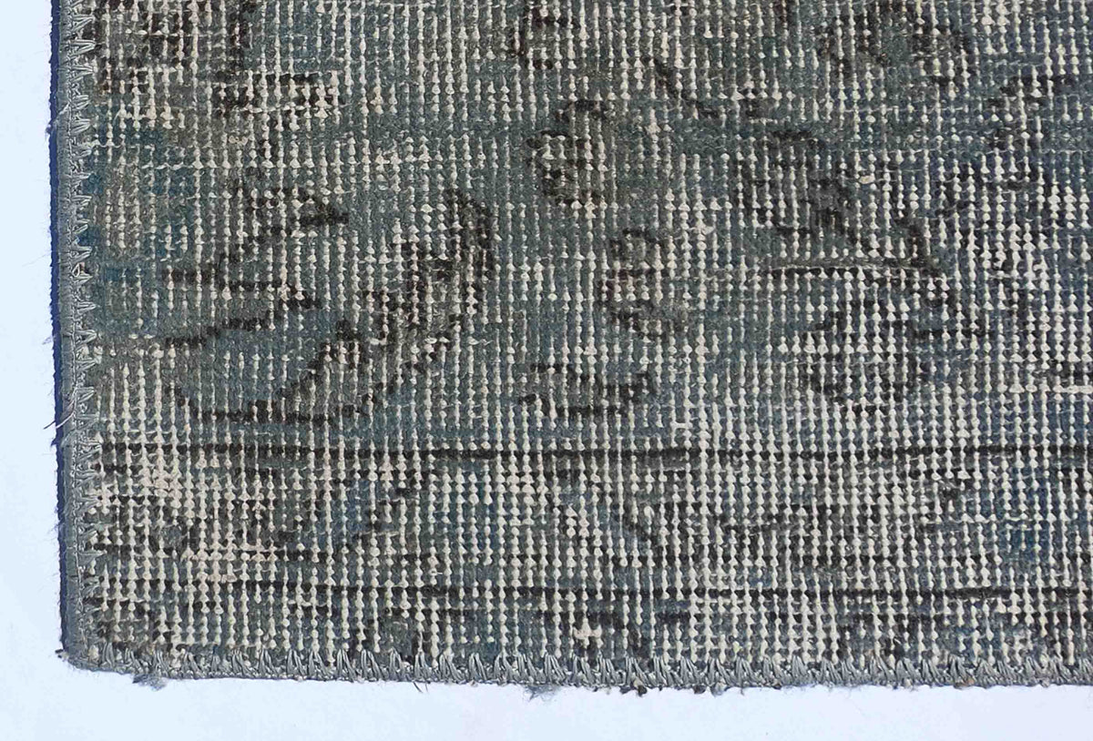 Aspecto envejecido de alfombra turca patchwork, ideal para living