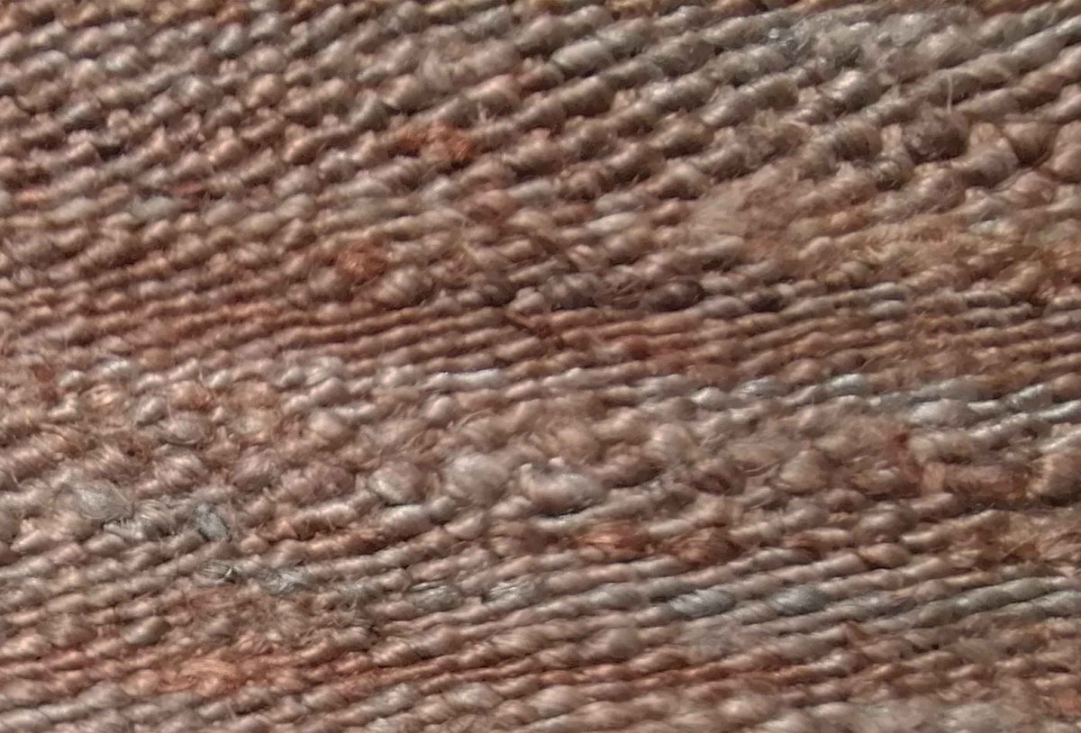 Detalle tejido en telar de alfombra sisal natural de origen indio
