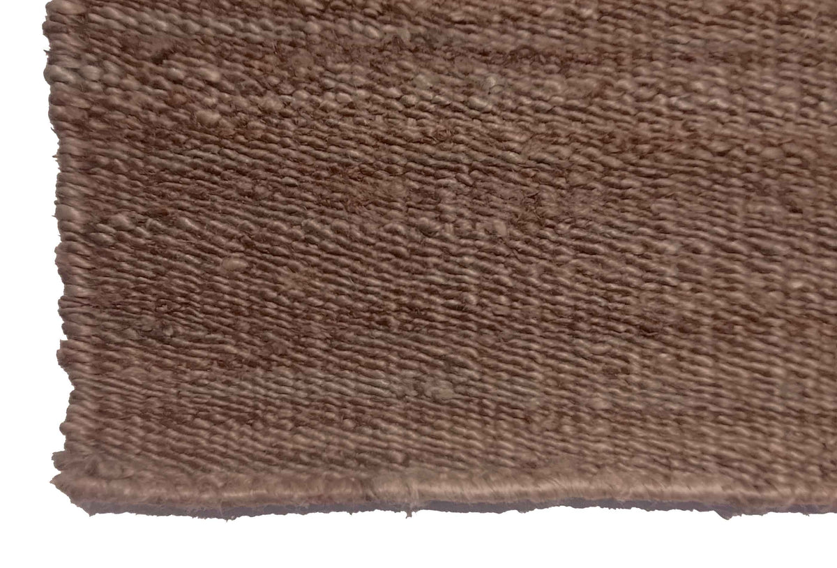 Textura resistente de sisal natural en alfombra importada
