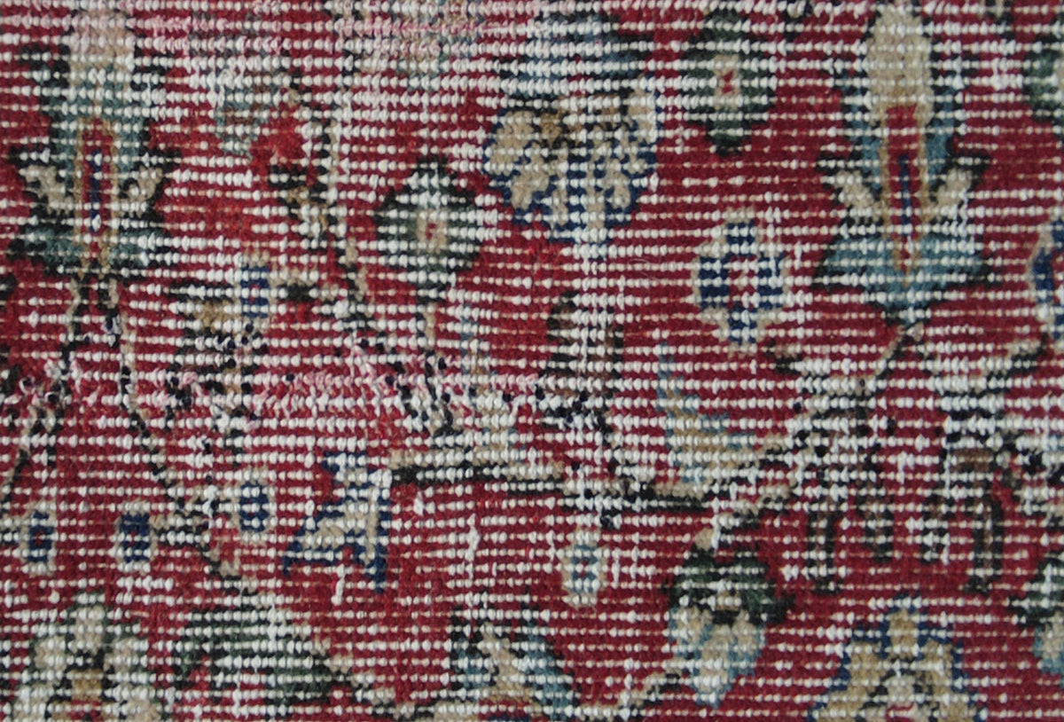 Textura detallada de lana en alfombra persa vintage importada