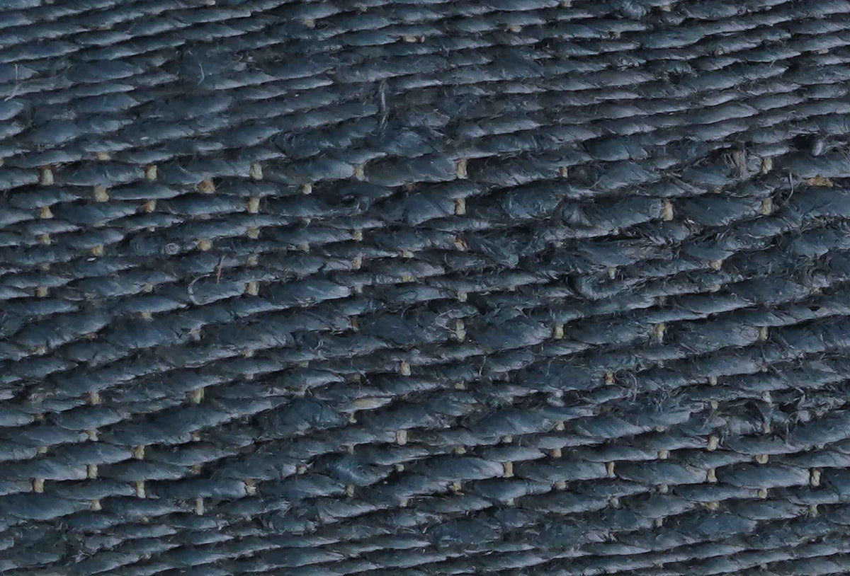 Detalle tejido plano de alfombra yute natural, estilo cálido