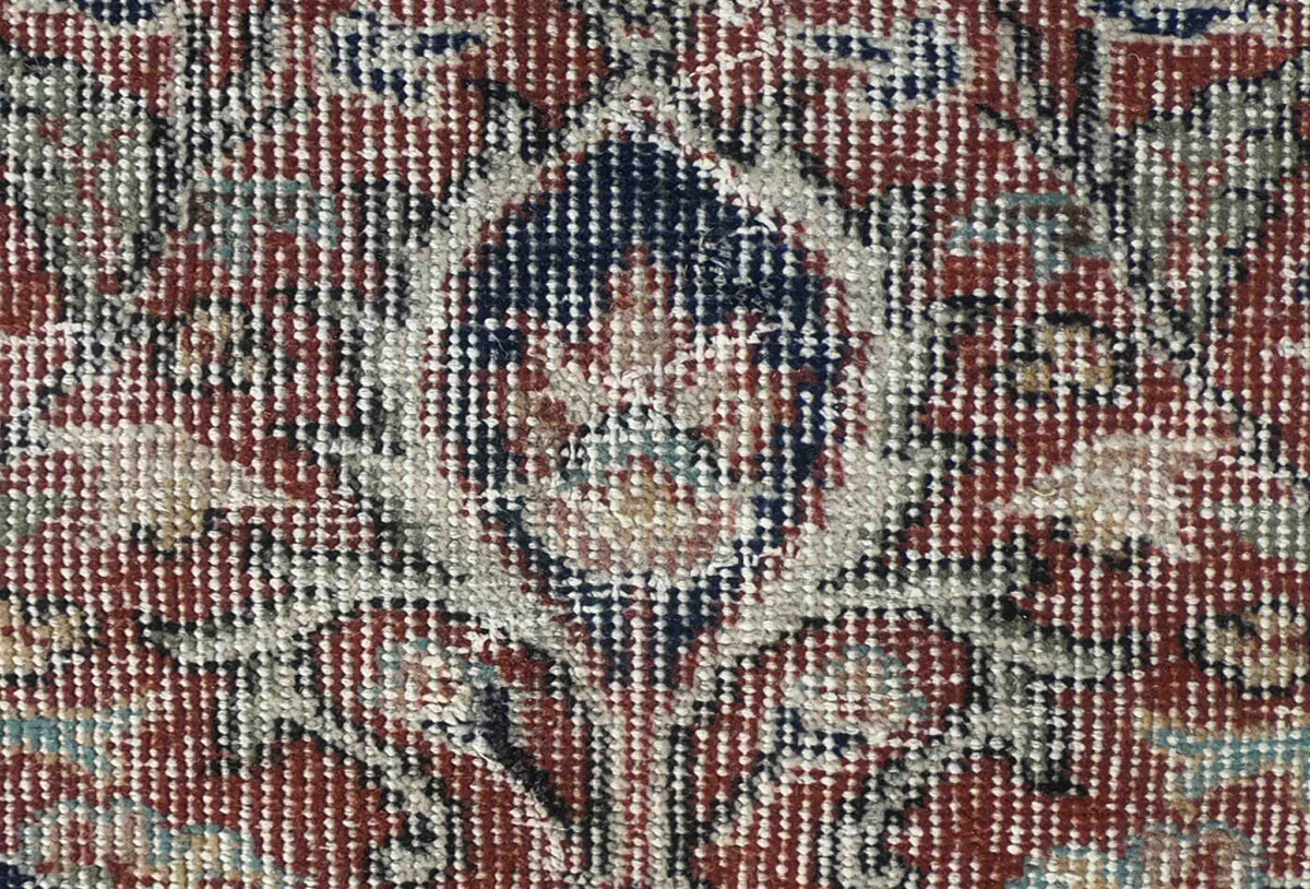 Textura de lana natural en alfombra persa vintage tejida a mano