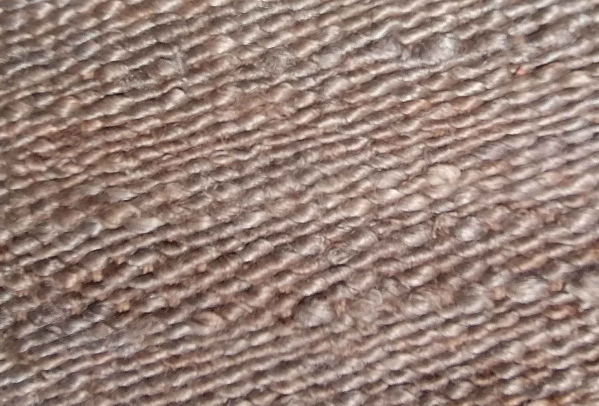 Textura de fibra de yute natural en alfombra importada, resistente