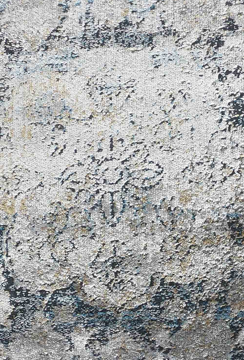 Detalle de patrón geométrico en alfombra turca importada de colores neutros