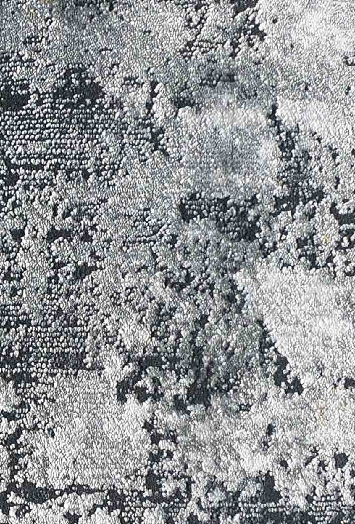 Detalle de patrón geométrico sutil en alfombra turca importada