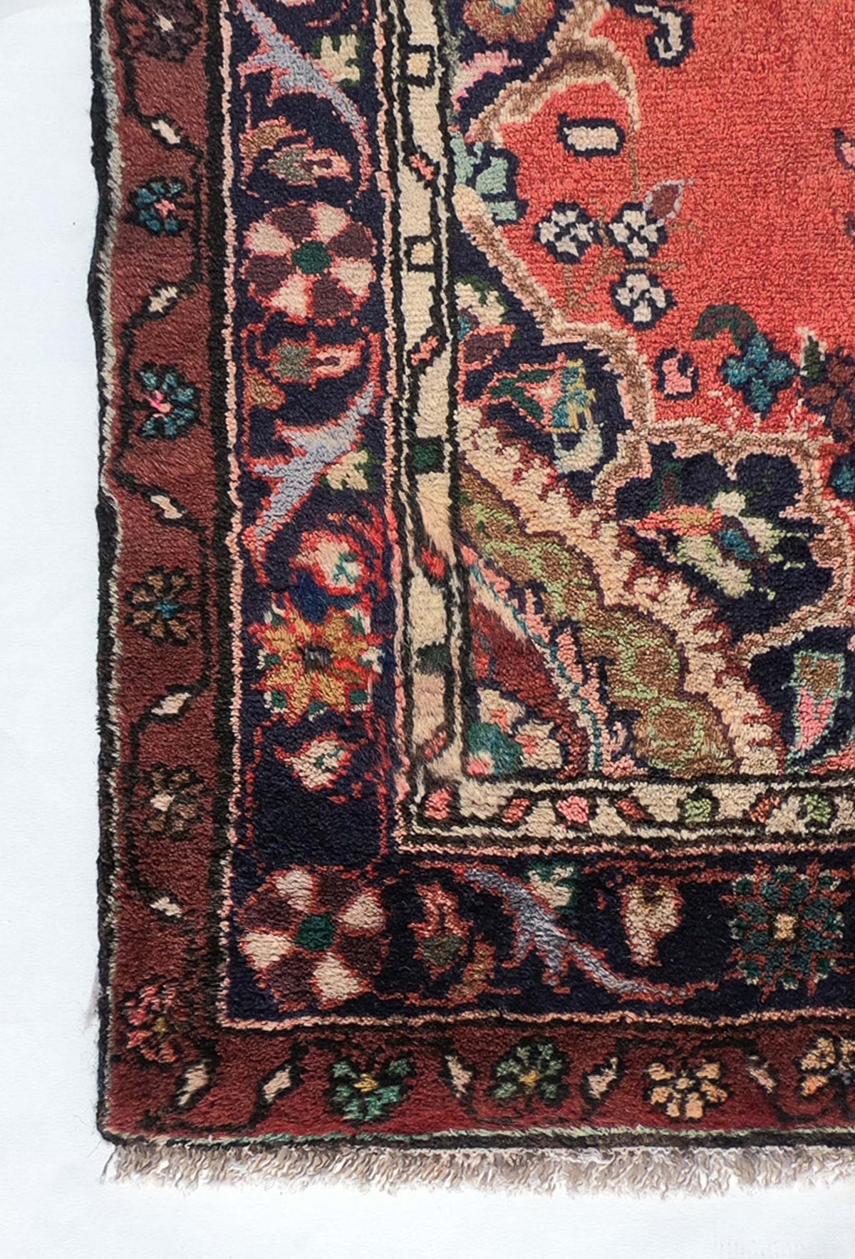 Textura de lana natural suave en alfombra hecha a mano, estilo Hamadan