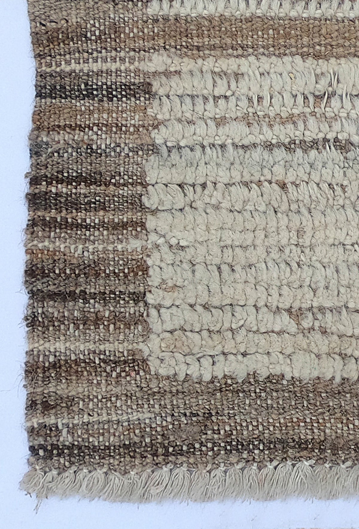 Textura natural del yute en alfombra india hecha a mano