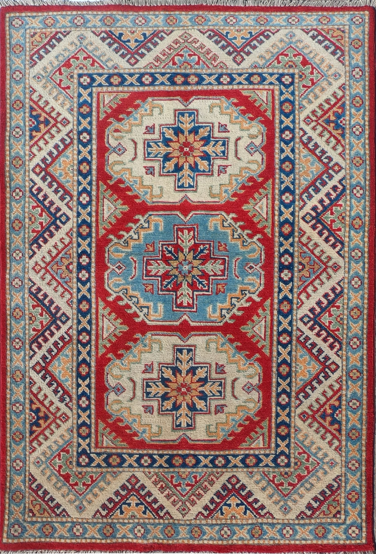 Alfombra persa Kazak de lana roja con diseño geométrico