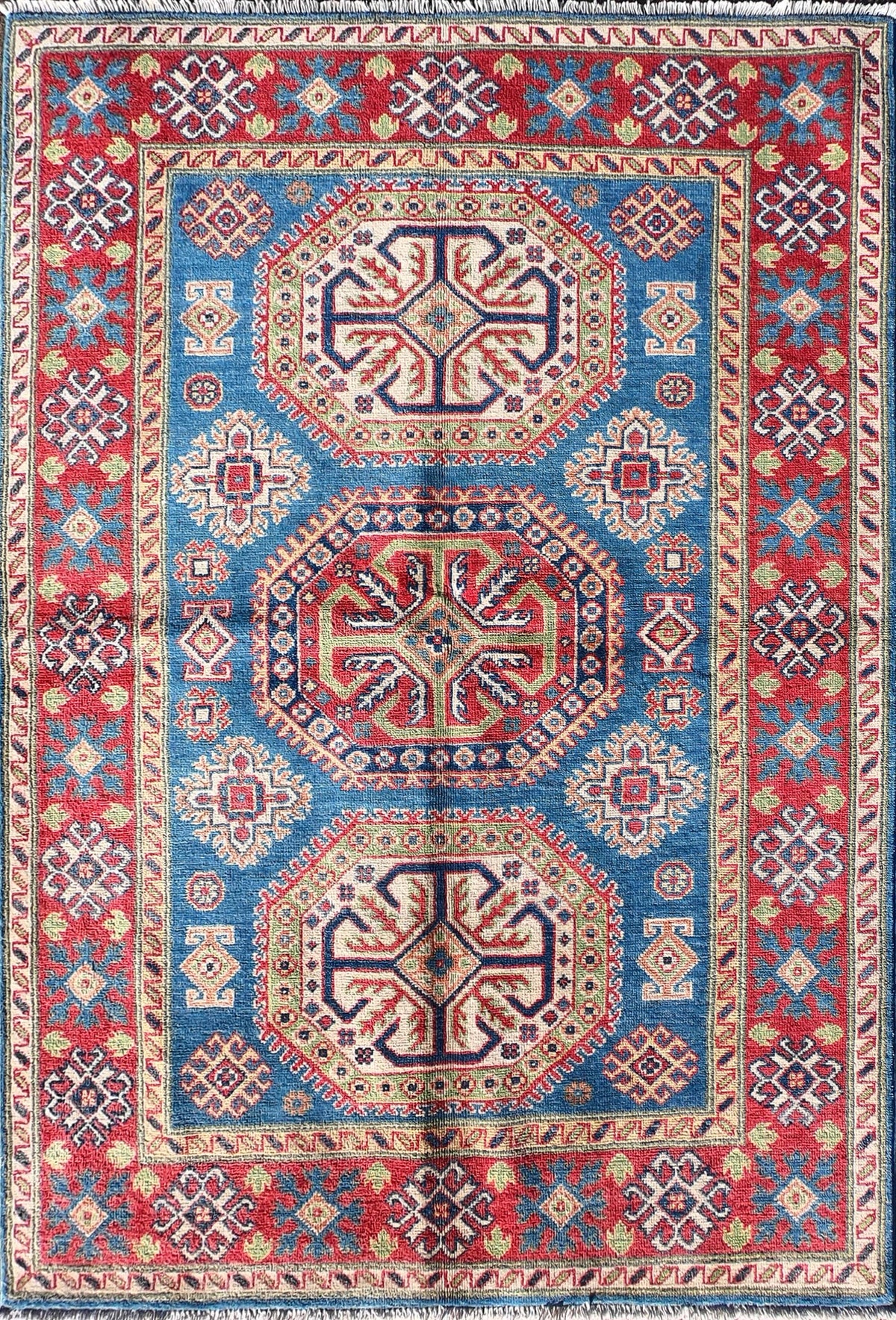 Alfombra persa de lana Kazak, diseño geométrico intenso - Consorcio Persa