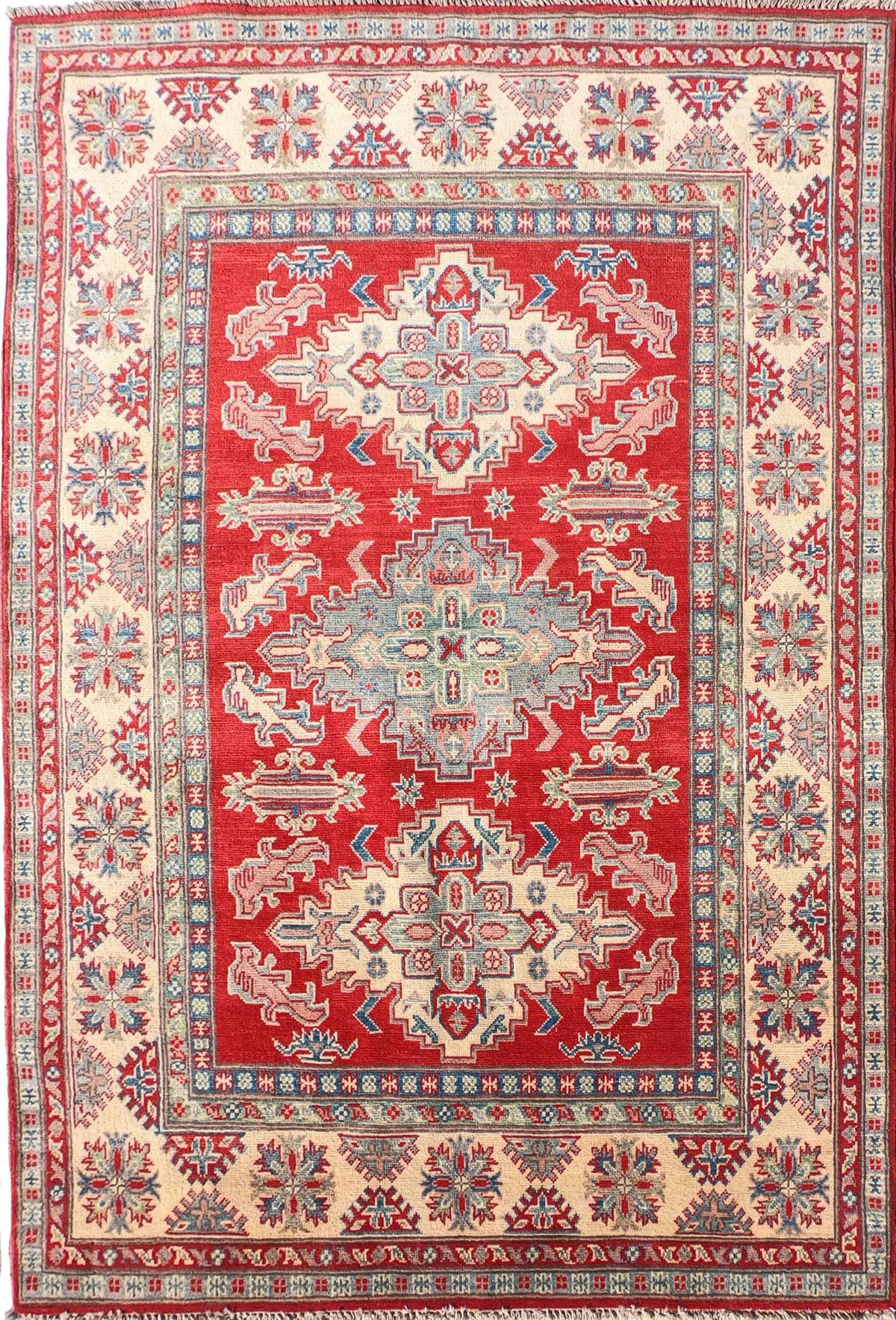 Alfombra persa Kazak de lana con diseño geométrico rojo