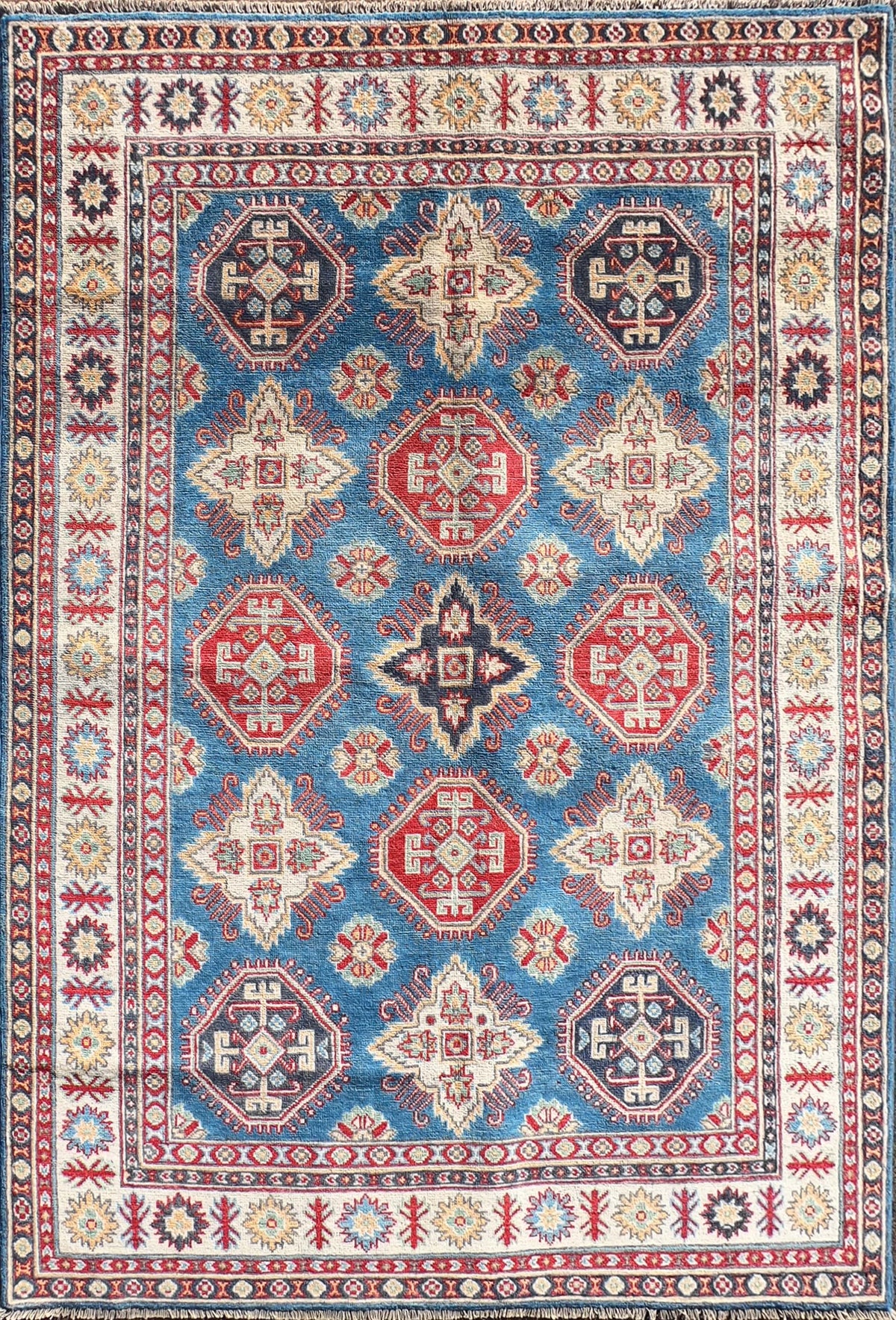 Alfombra persa de lana Kazak, diseño geométrico rojo intenso - Consorcio Persa