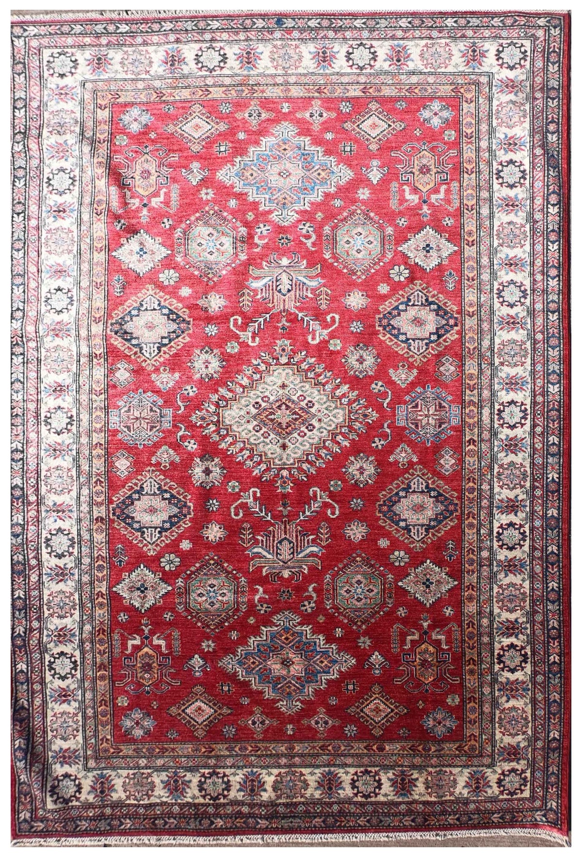 Alfombra persa Kazak Ghazni de lana con diseño floral rojo y azul