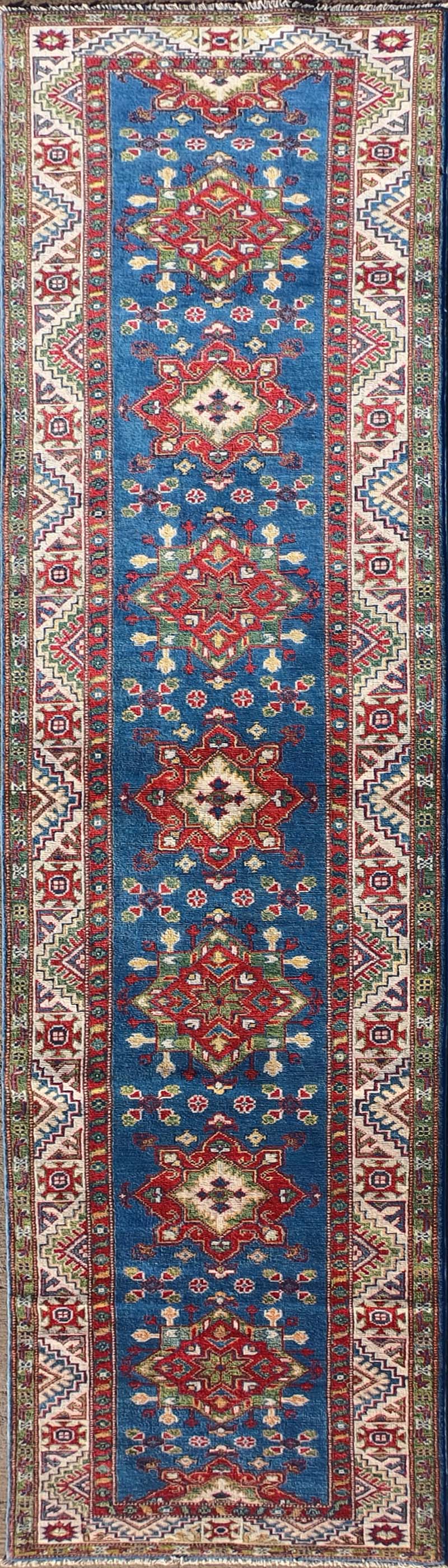 Alfombra persa de lana Kazak, diseño geométrico rojo intenso - Consorcio Persa