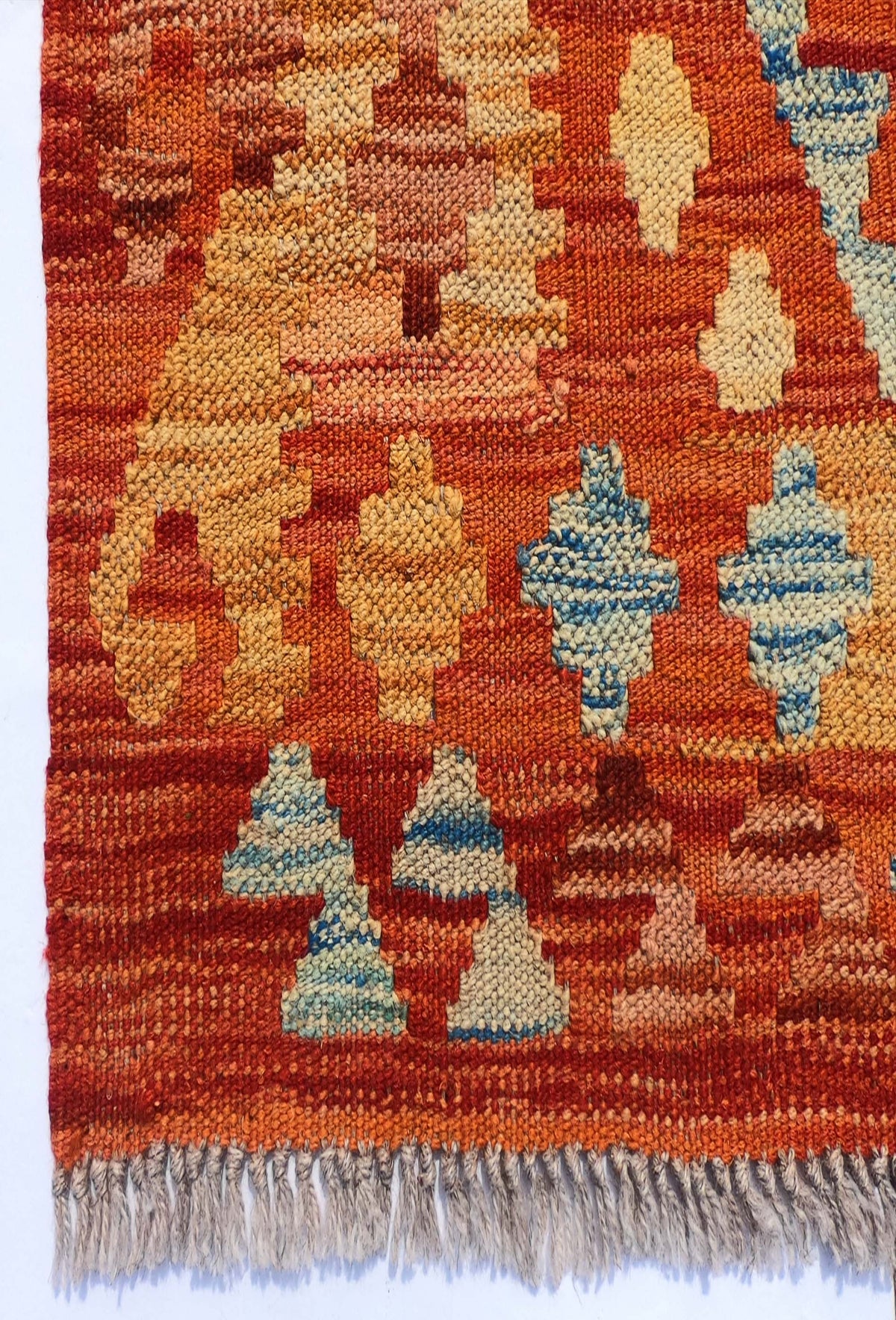 Textura de lana natural en alfombra Kelim de tejido plano artesanal