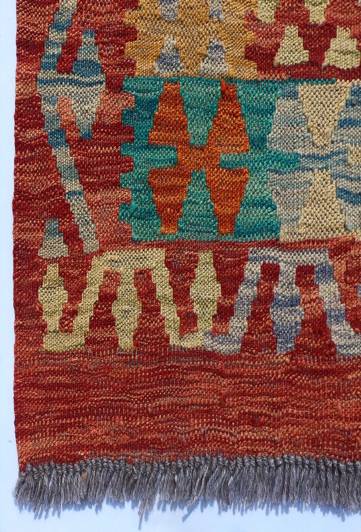 Textura de lana natural en alfombra Kelim de tejido plano artesanal