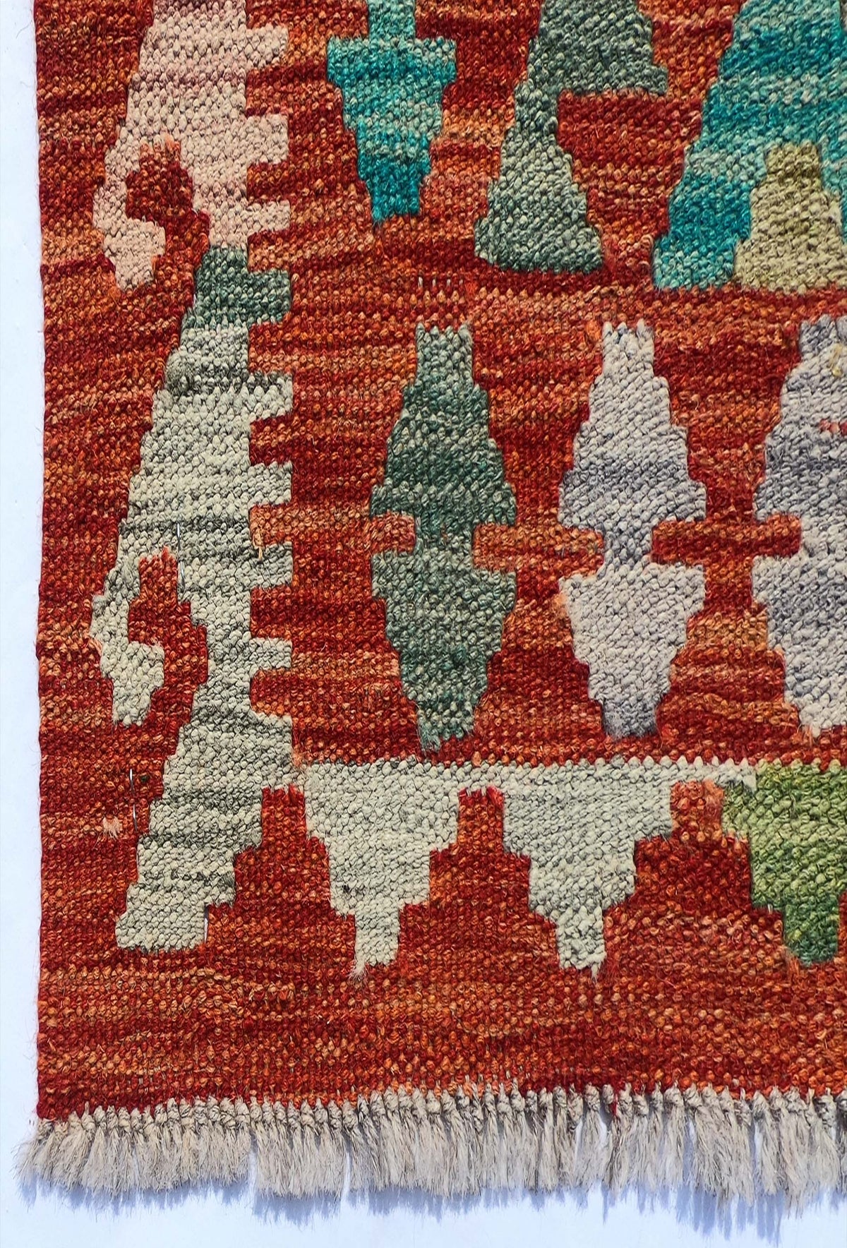 Textura natural de la lana en alfombra Kelim hecha a mano, origen Pakistaní