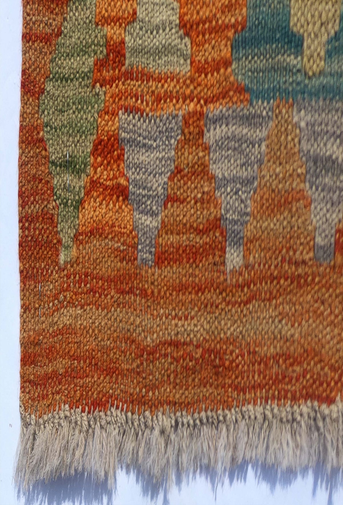 Textura de lana natural en alfombra Kelim hecha a mano con tintes naturales