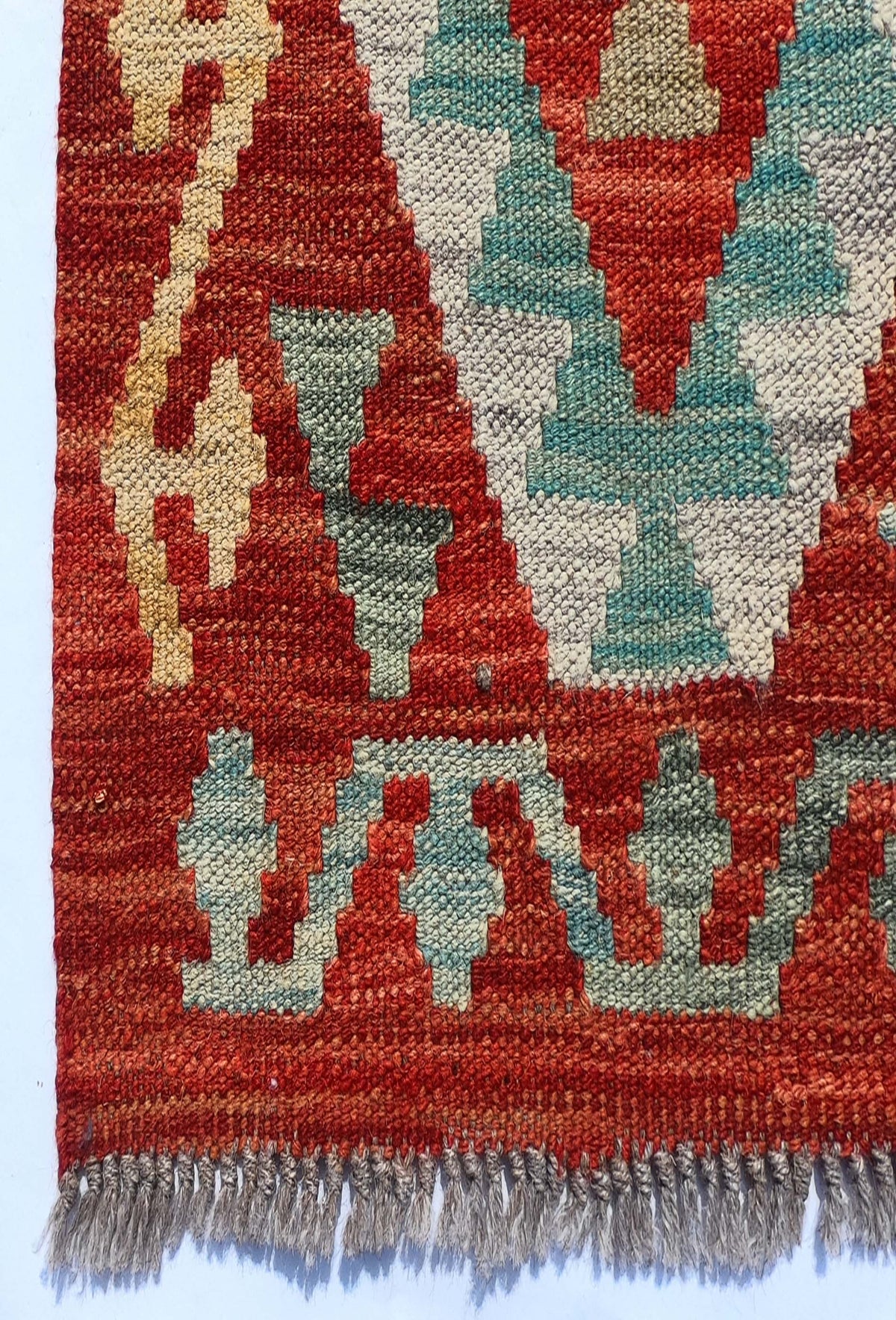 Textura natural del tejido plano de lana en alfombra Kelim importada