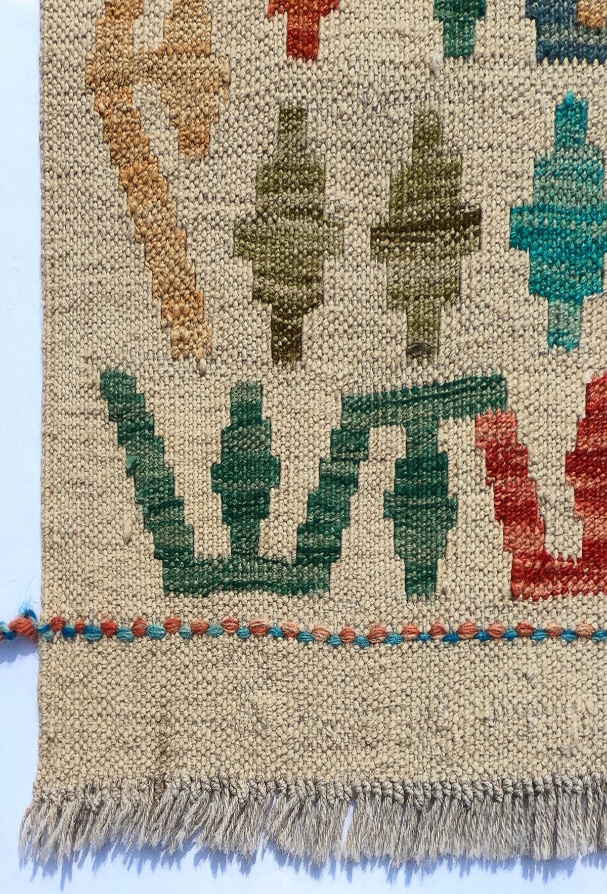 Textura de lana natural en alfombra Kelim hecha a mano