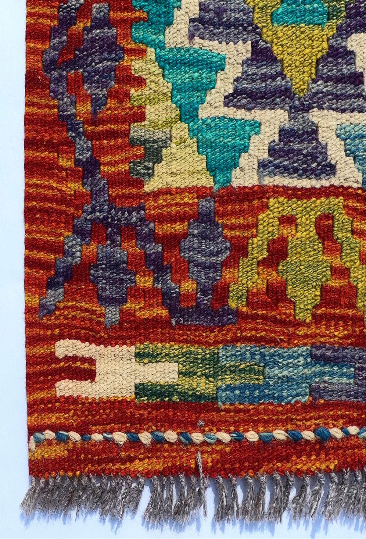 Textura de lana natural en alfombra Kelim hecha a mano con tejido plano