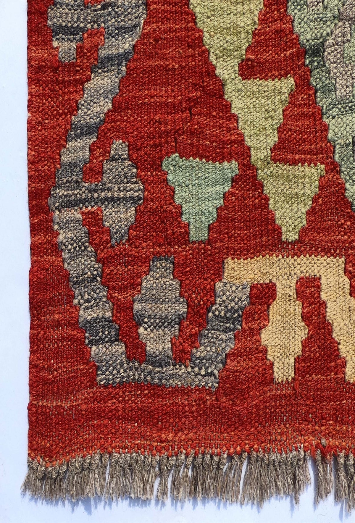 Textura natural de la lana en alfombra Kelim importada hecha a mano