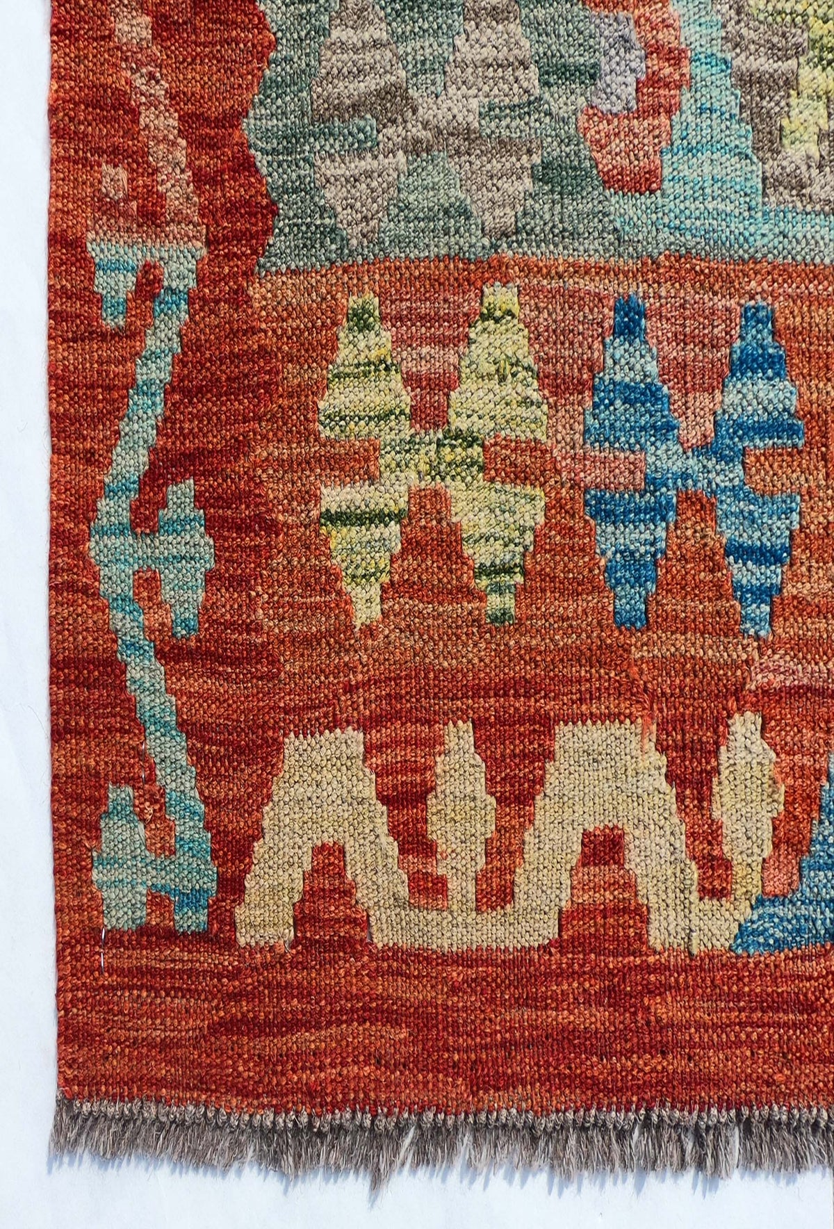 Textura de lana natural en alfombra Kelim hecha a mano, origen Pakistaní