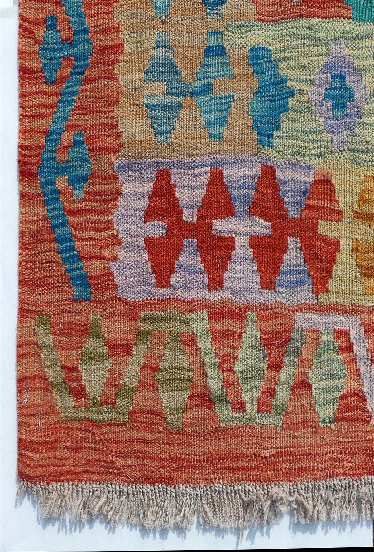 Textura natural de lana en alfombra hecha a mano con tintes naturales