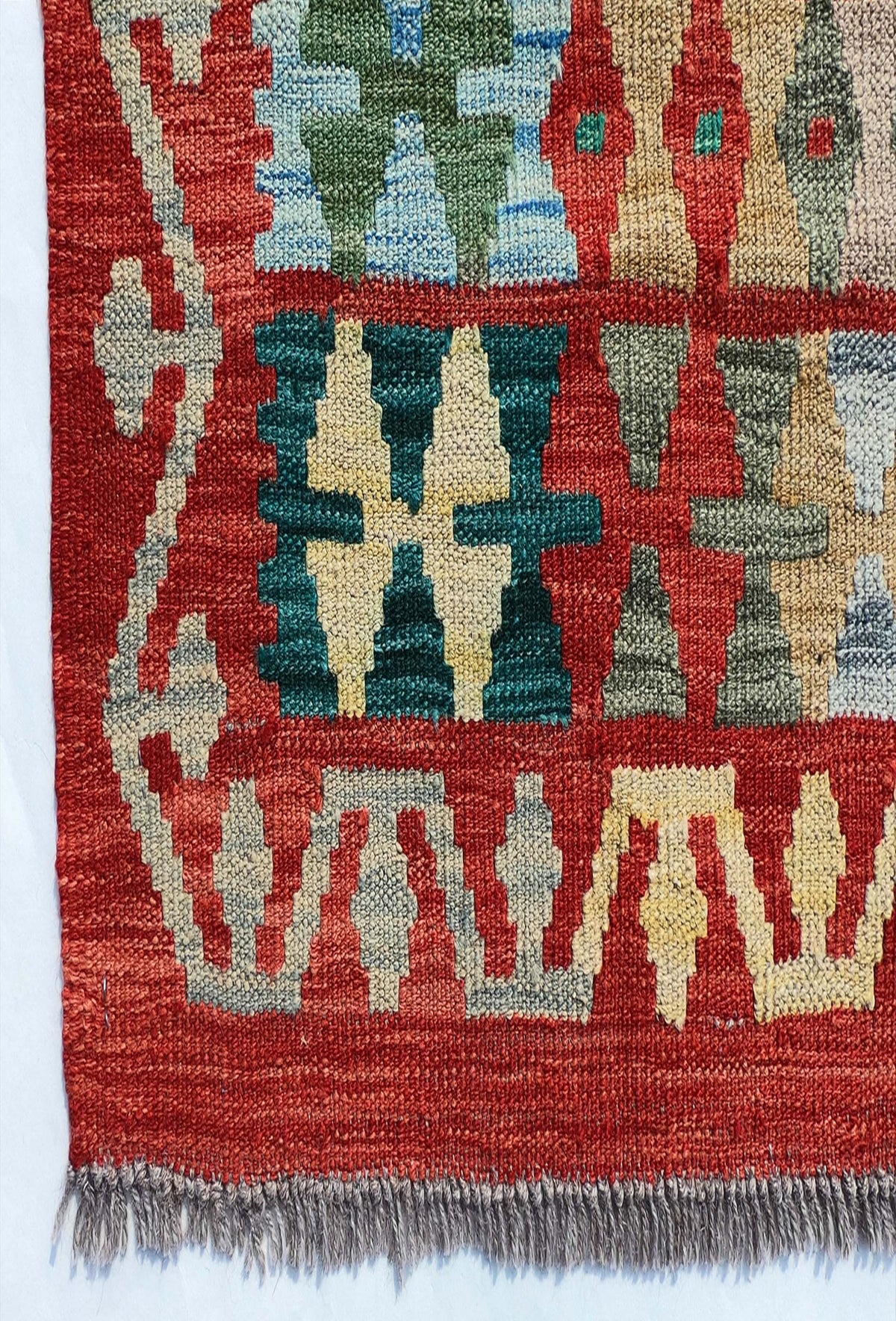 Textura natural de lana en alfombra Kelim importada