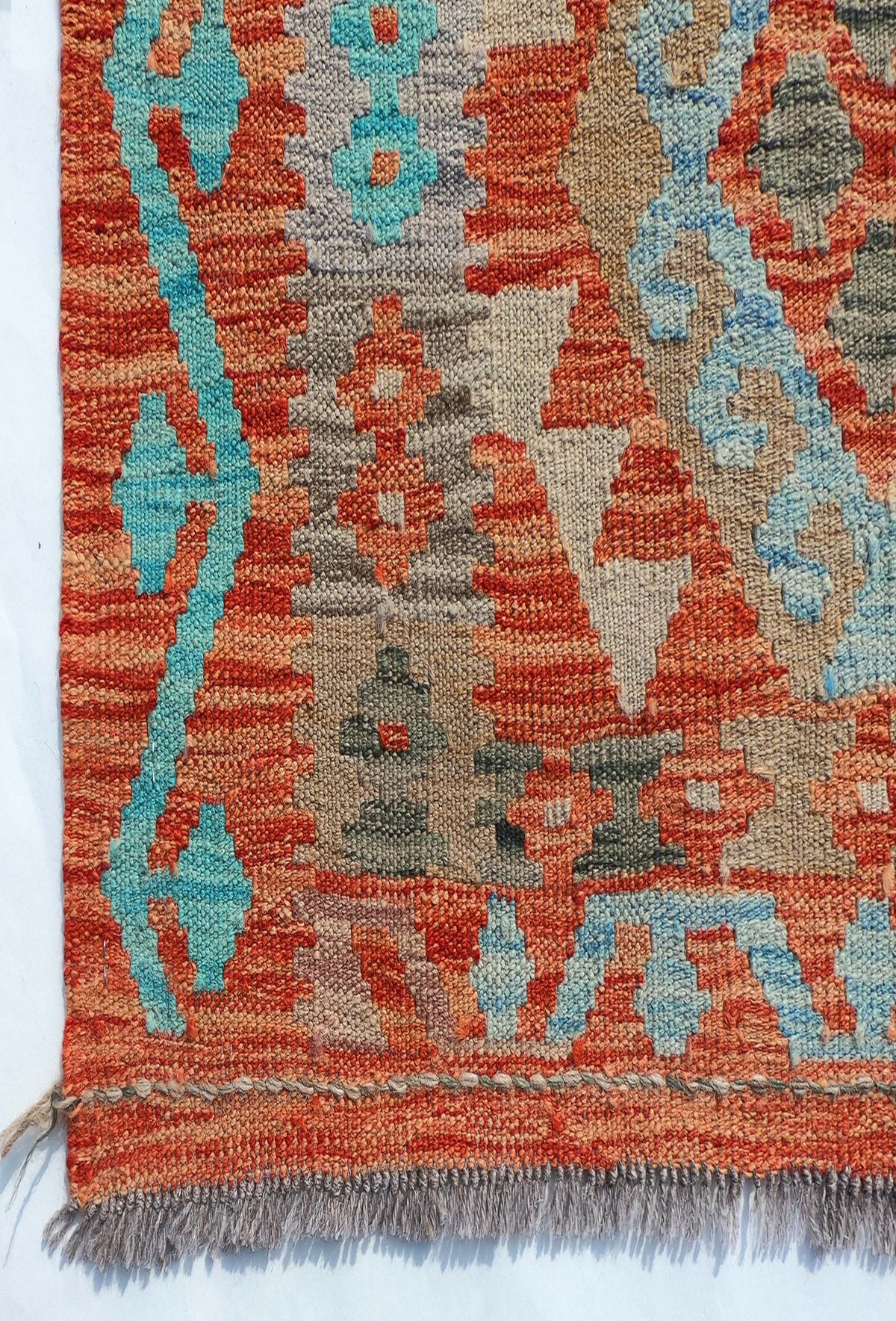 Textura de lana natural en alfombra Kelim hecha a mano, estilo tejido plano