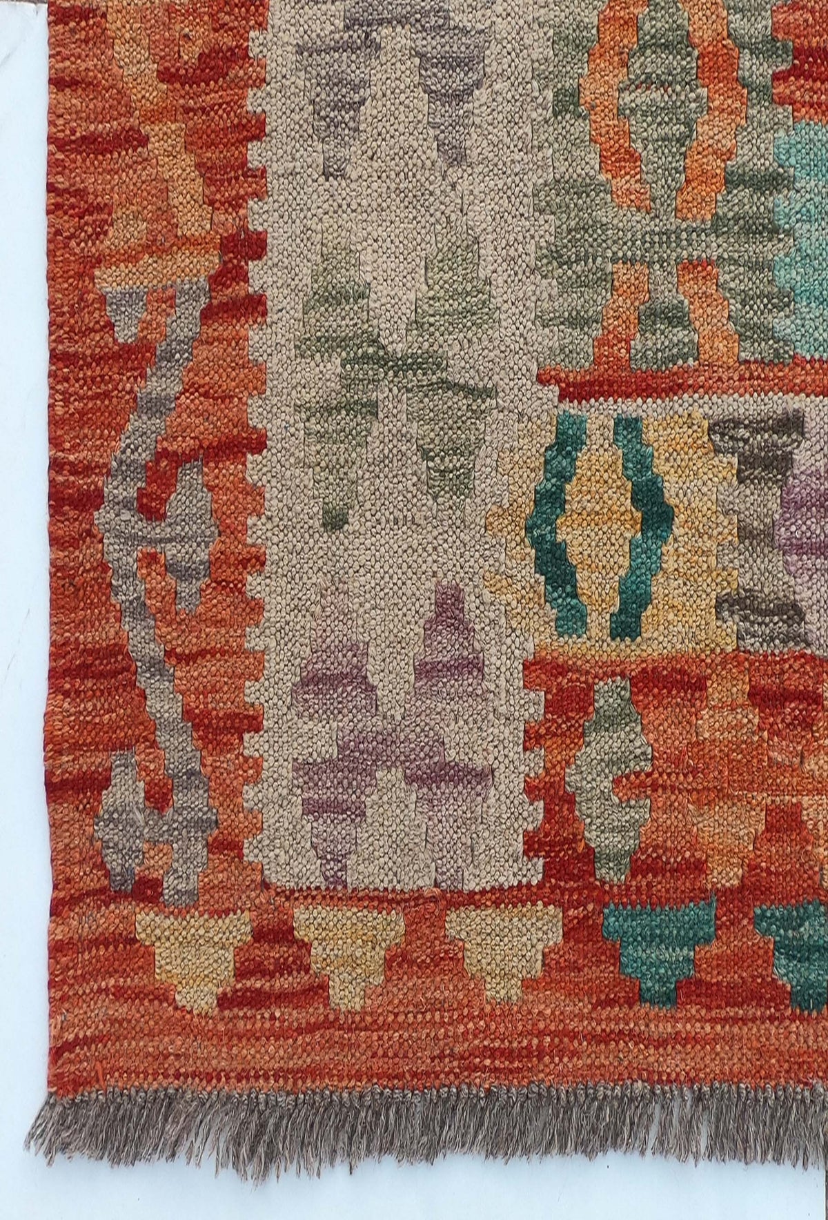 Textura natural del tejido plano en alfombra de lana Kelim