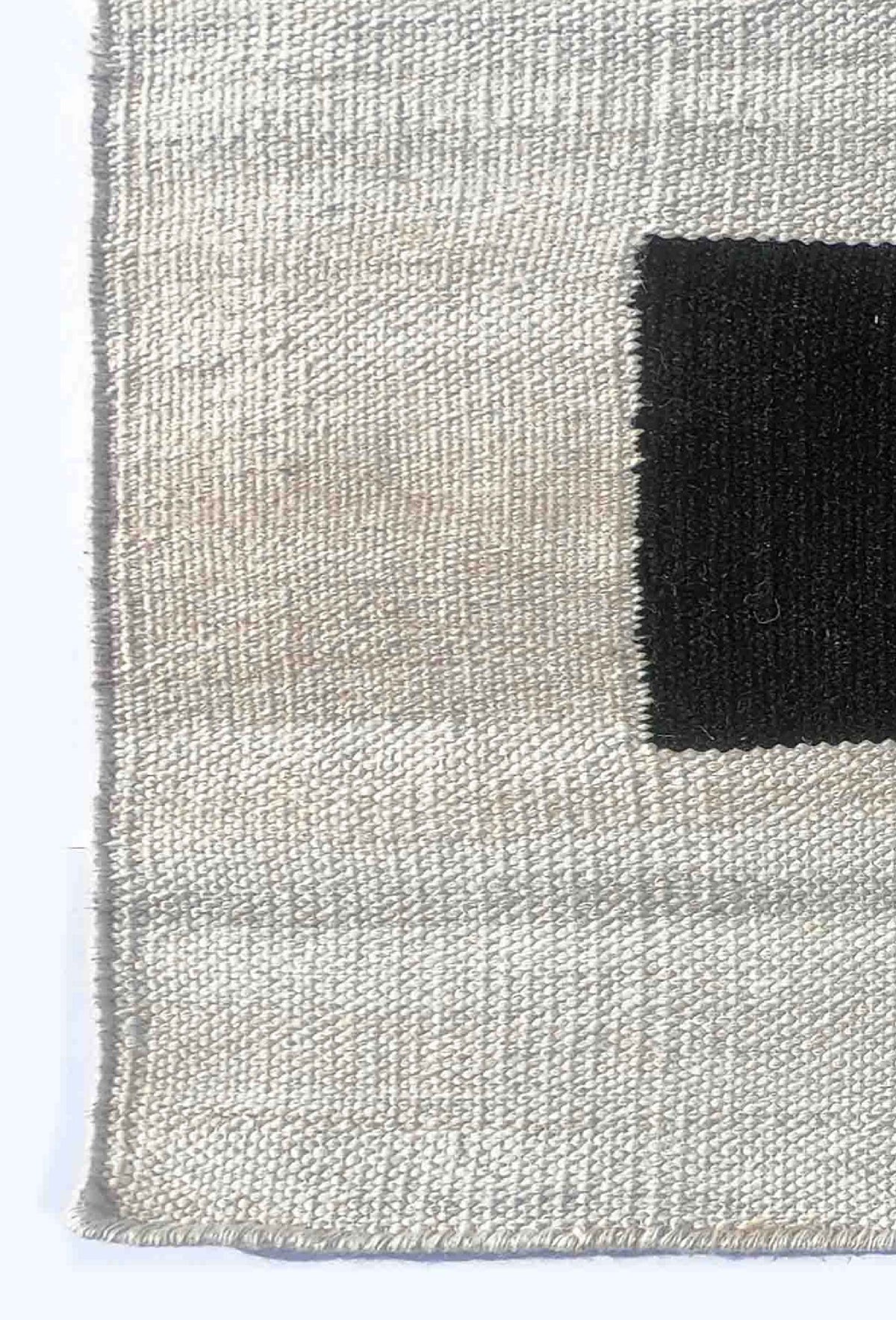 Textura natural de lana en alfombra Kelim de tejido plano