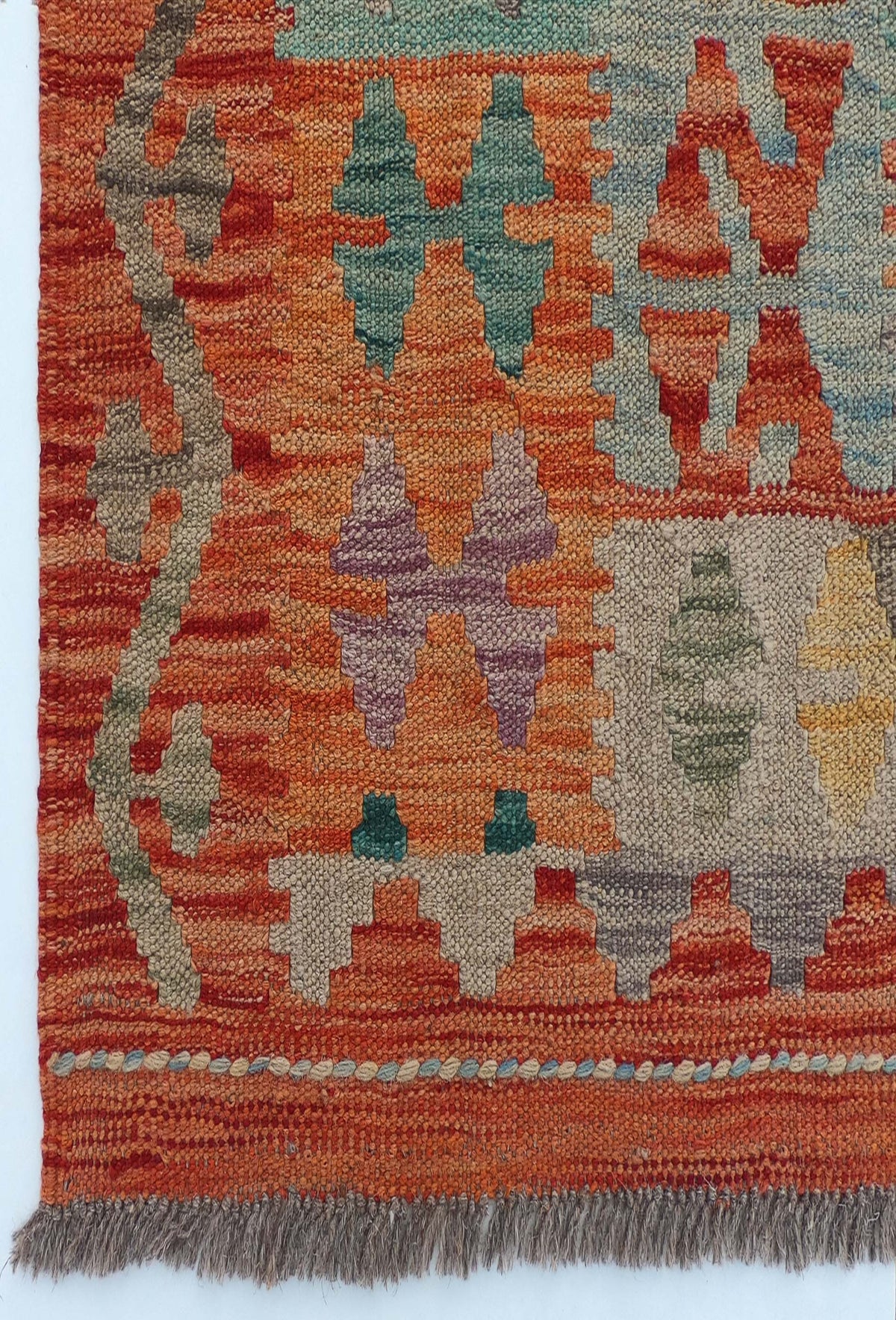 Textura natural de la lana en alfombra Kelim artesanal de Pakistán