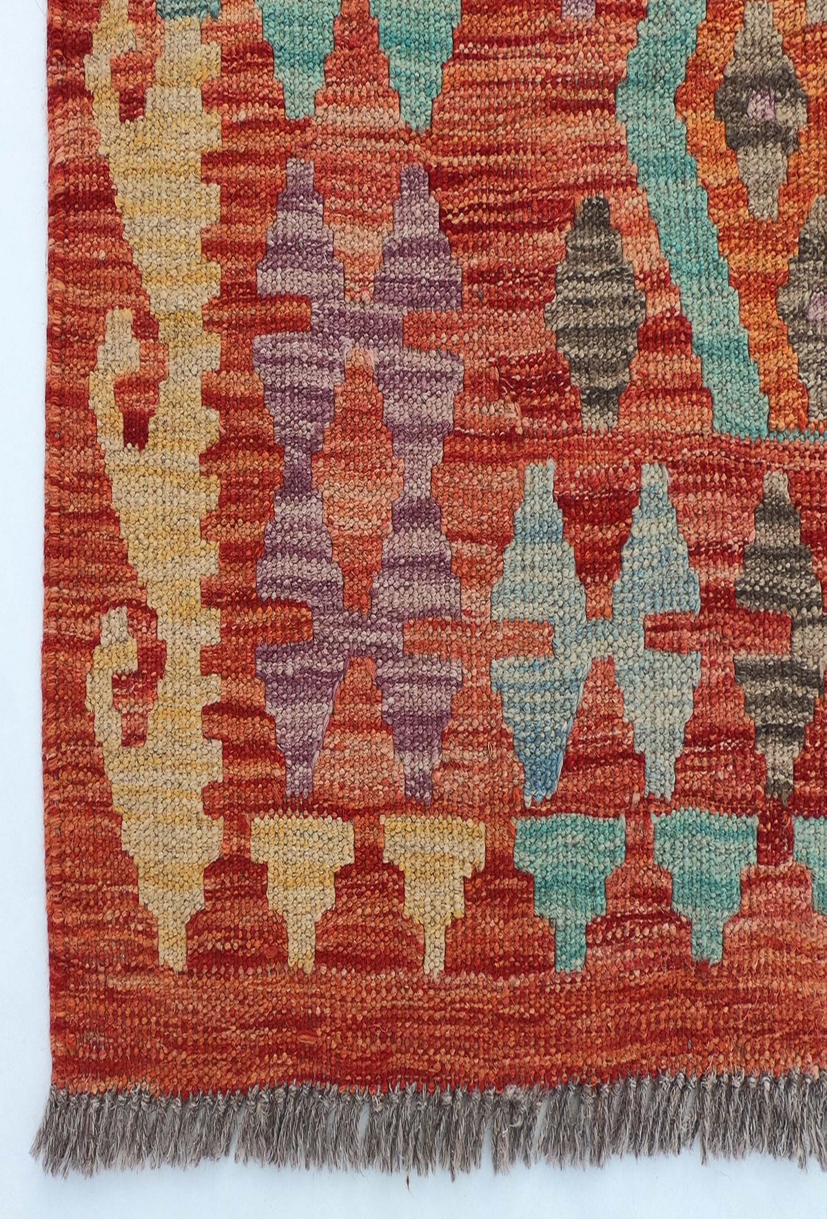 Textura de lana natural en alfombra Kelim de tejido plano artesanal