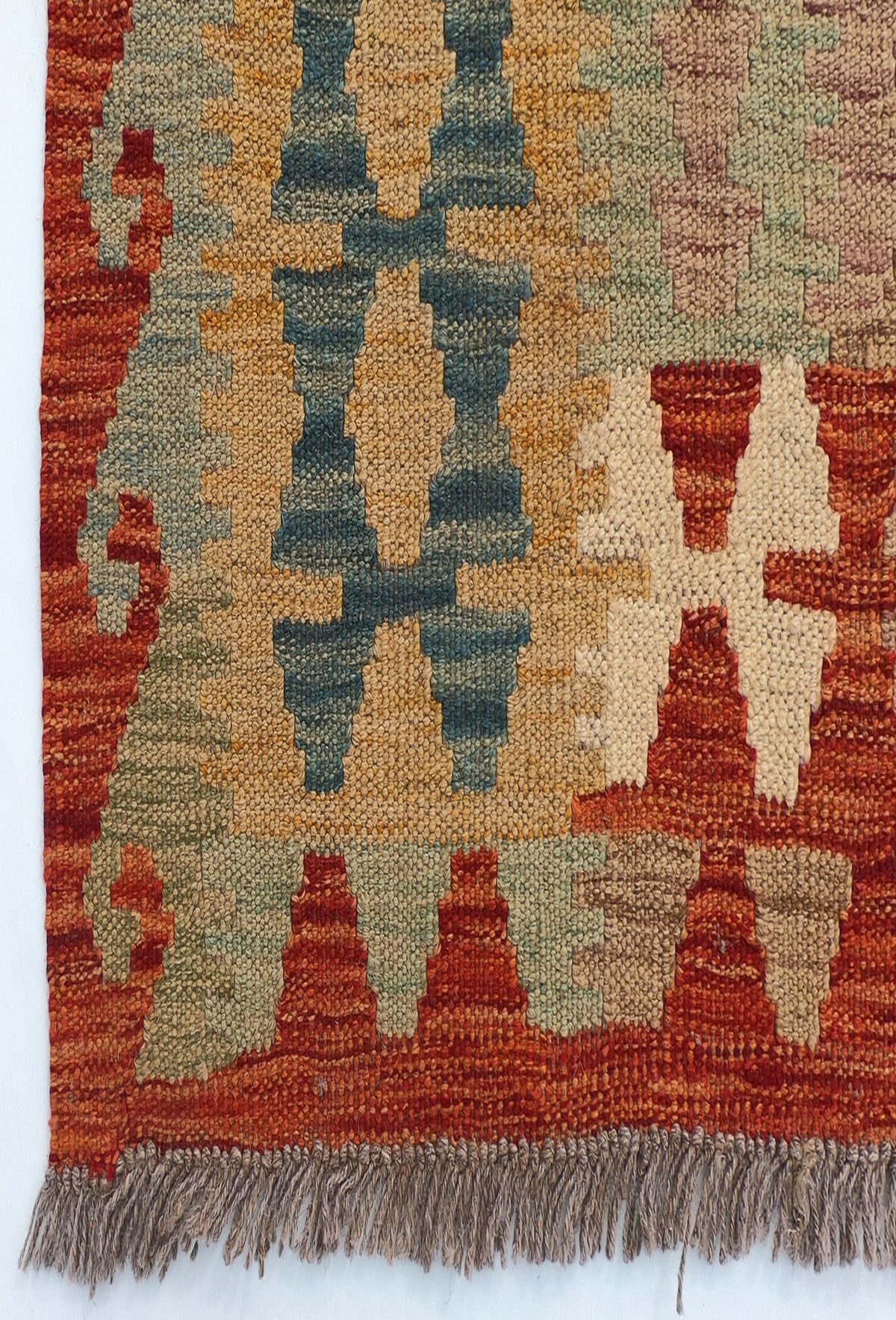 Textura de lana natural en alfombra Kelim de tejido plano artesanal