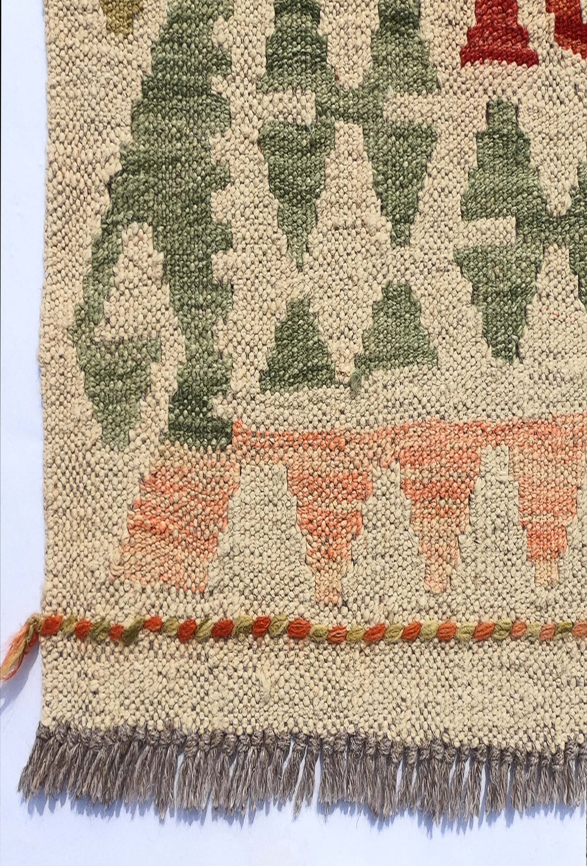 Textura natural de lana en alfombra Kelim tejida a mano