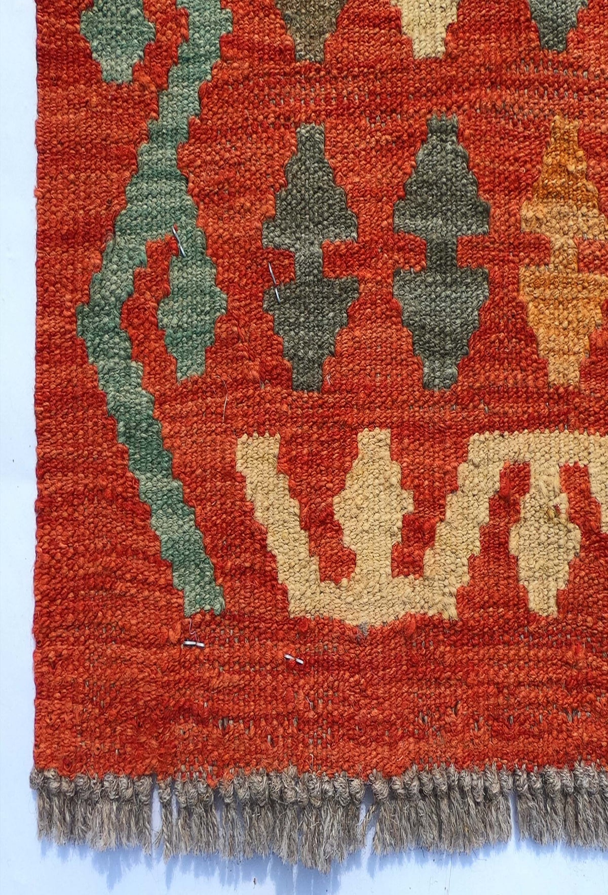 Textura de lana natural en alfombra Kelim hecha a mano, tejido plano