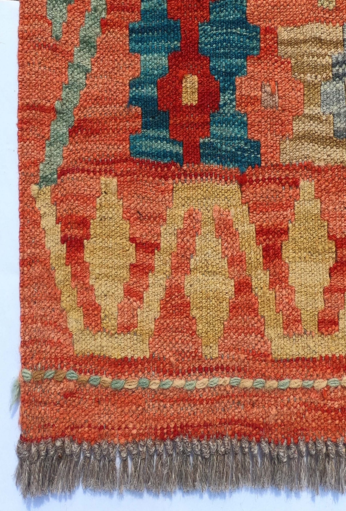 Textura de lana natural en alfombra importada hecha a mano