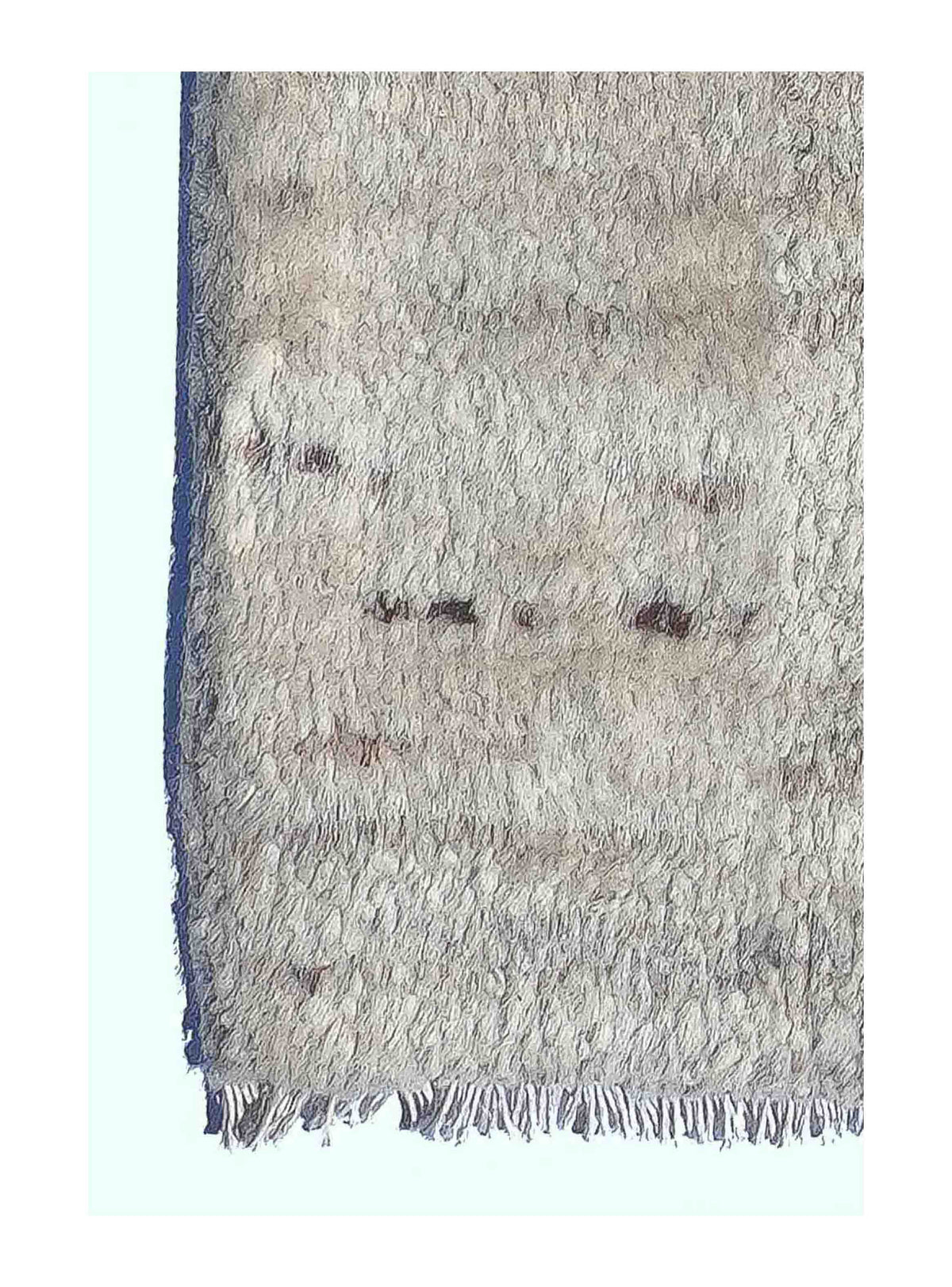 Textura de lana natural en alfombra importada hecha a mano