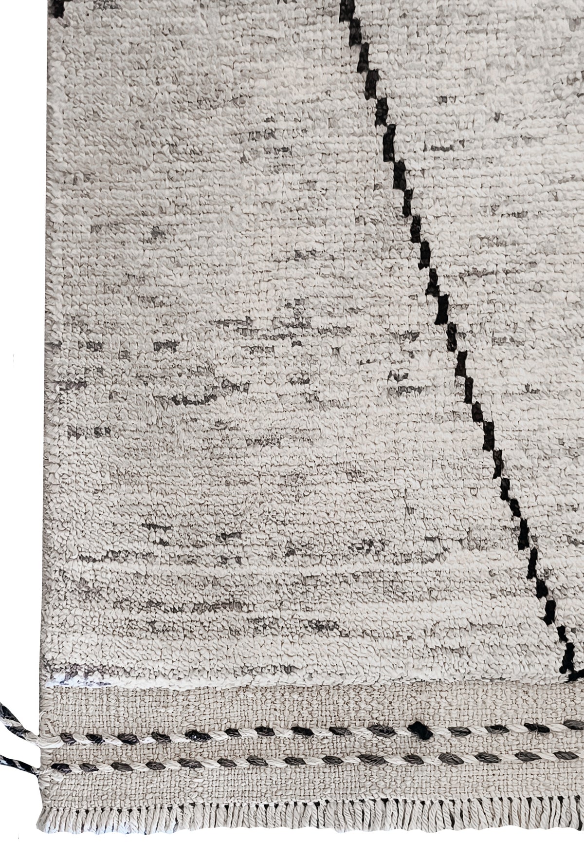 Detalle de la textura de alfombra de lana anudada a mano