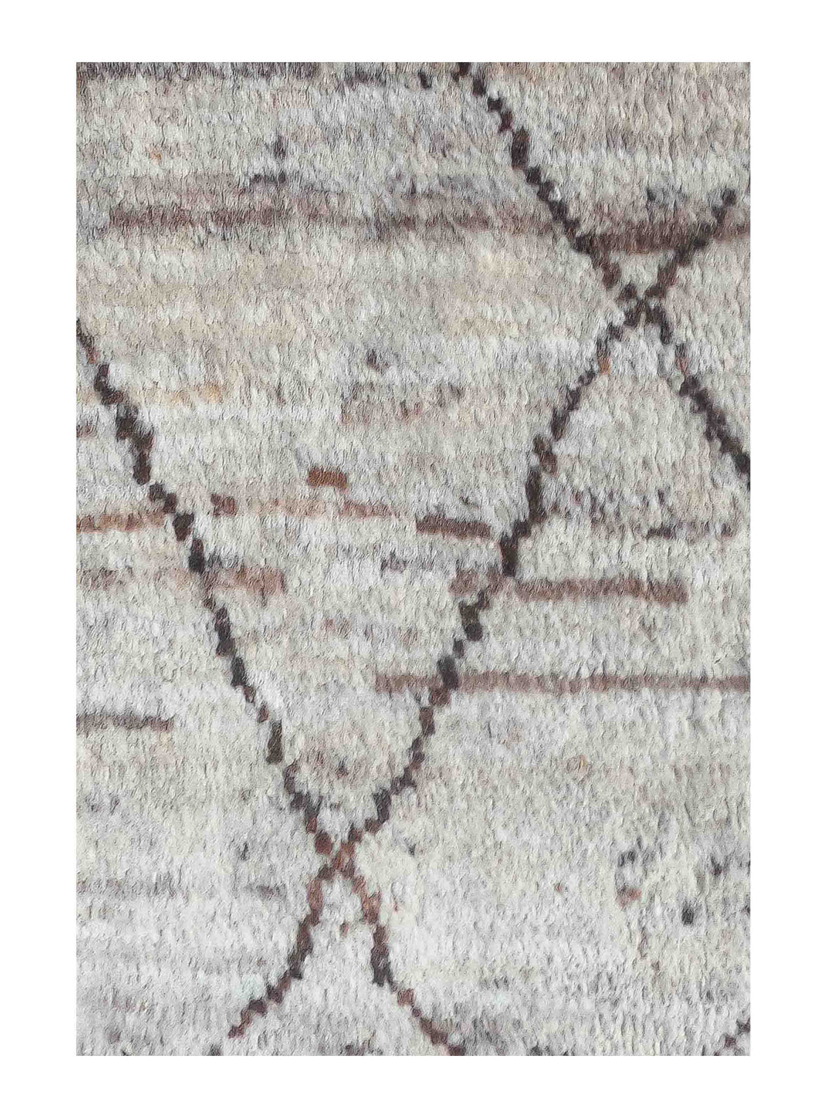Detalle de diseño intrincado en alfombra persa hecha a mano
