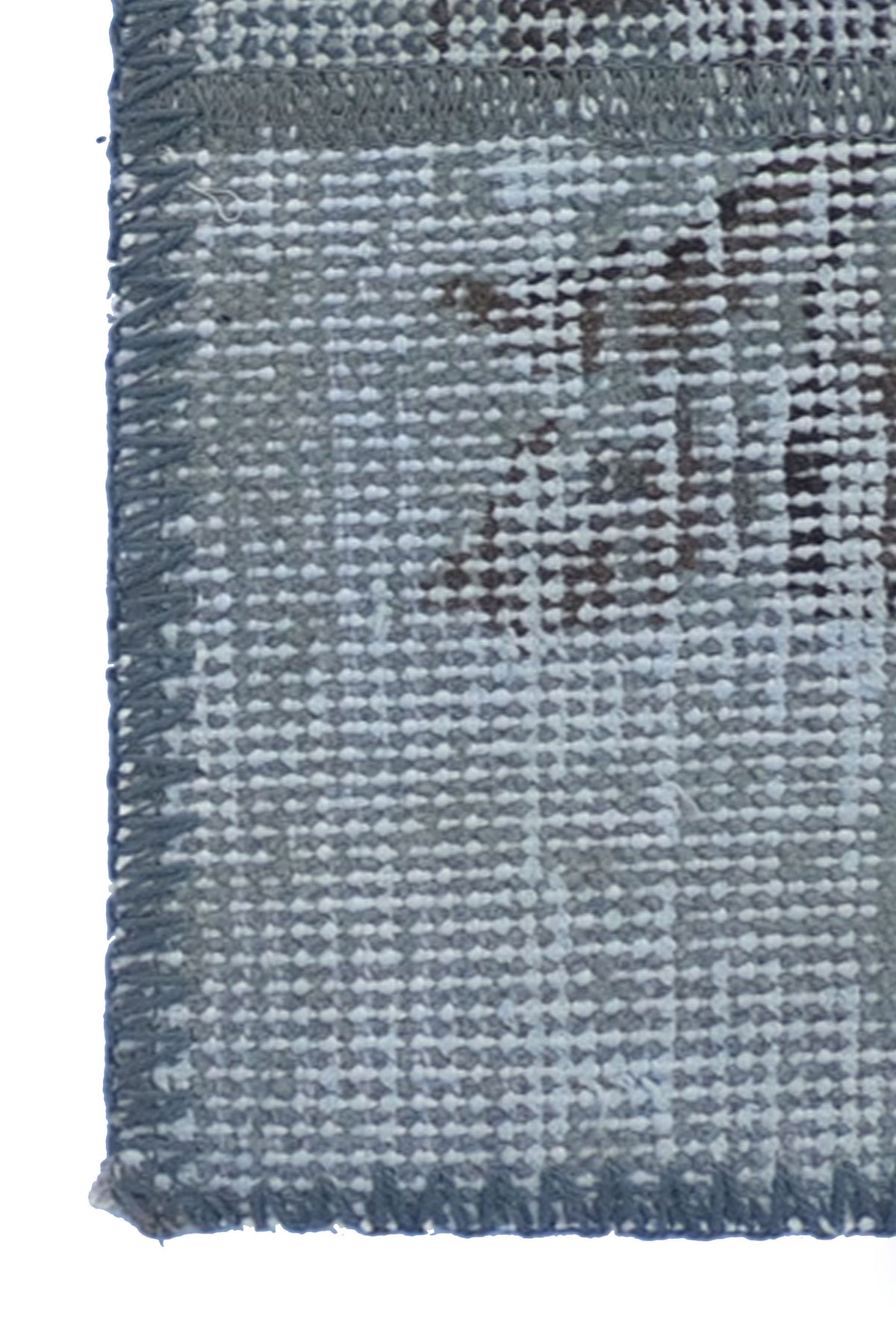 Textura de lana natural en alfombra persa hecha a mano, tejido artesanal visible