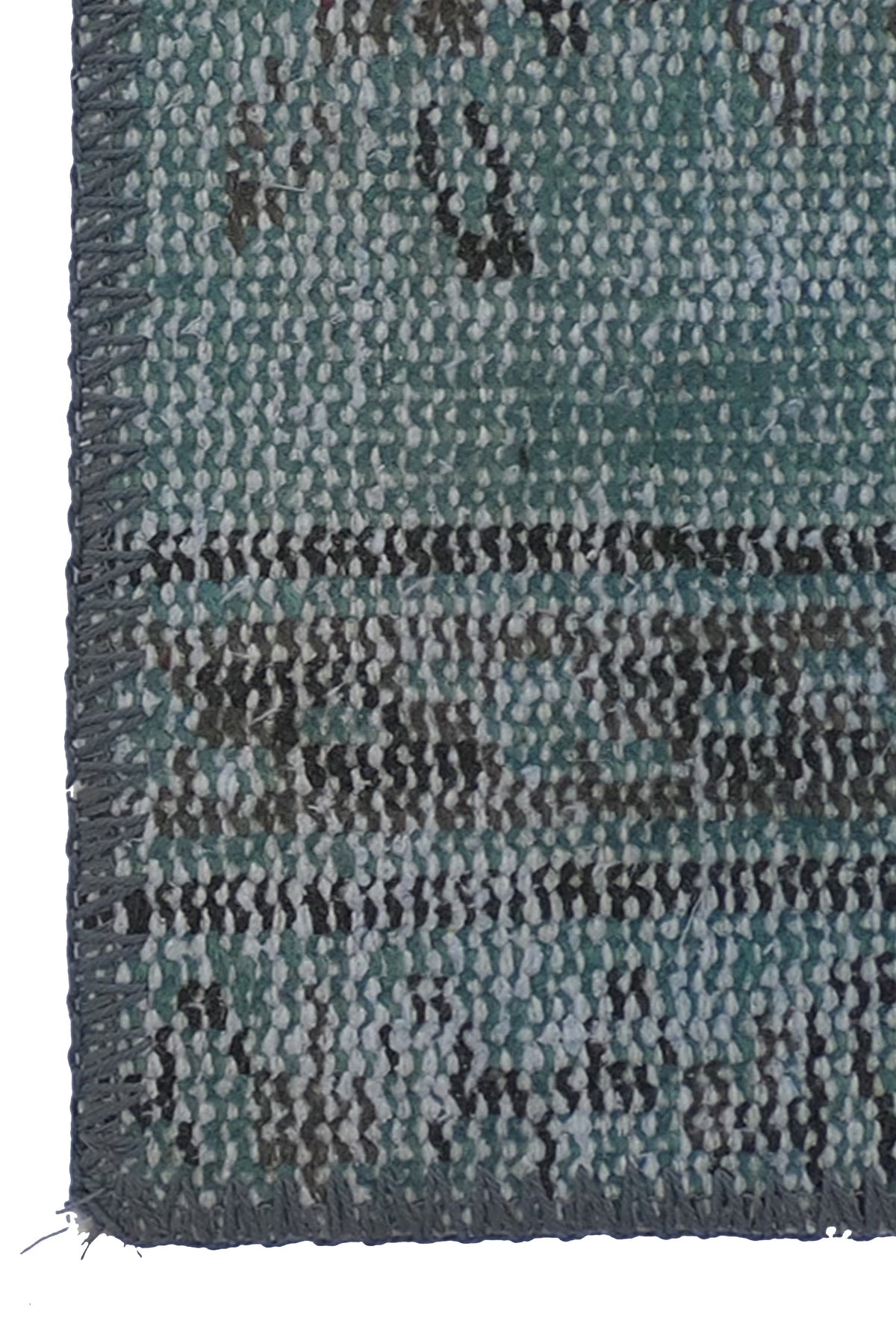 Textura de lana natural en alfombra decorativa hecha a mano