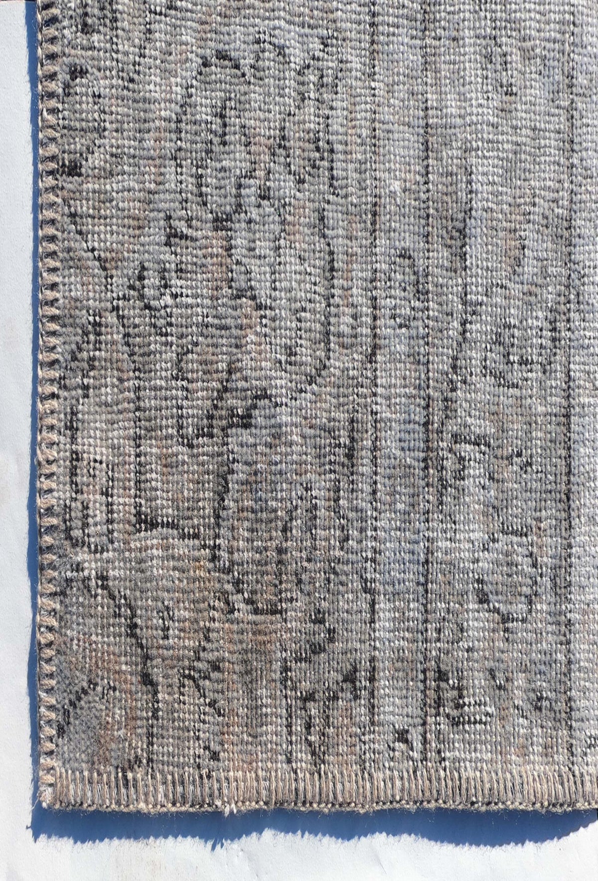 Textura de lana natural en alfombra turca patchwork hecha a mano