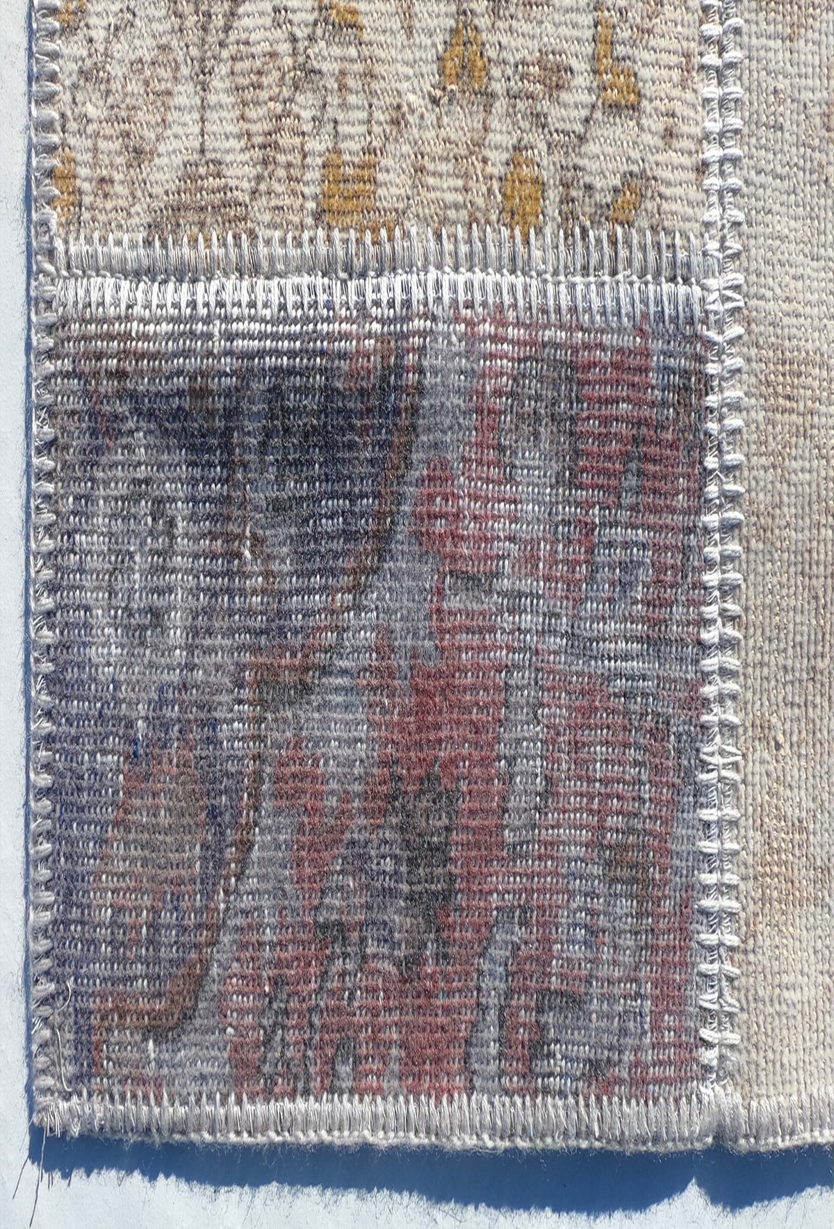 Textura de lana natural en alfombra turca hecha a mano