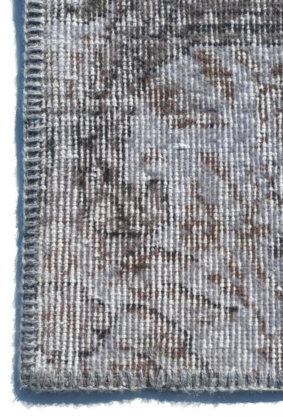 Textura natural de la lana en alfombra decorativa hecha a mano