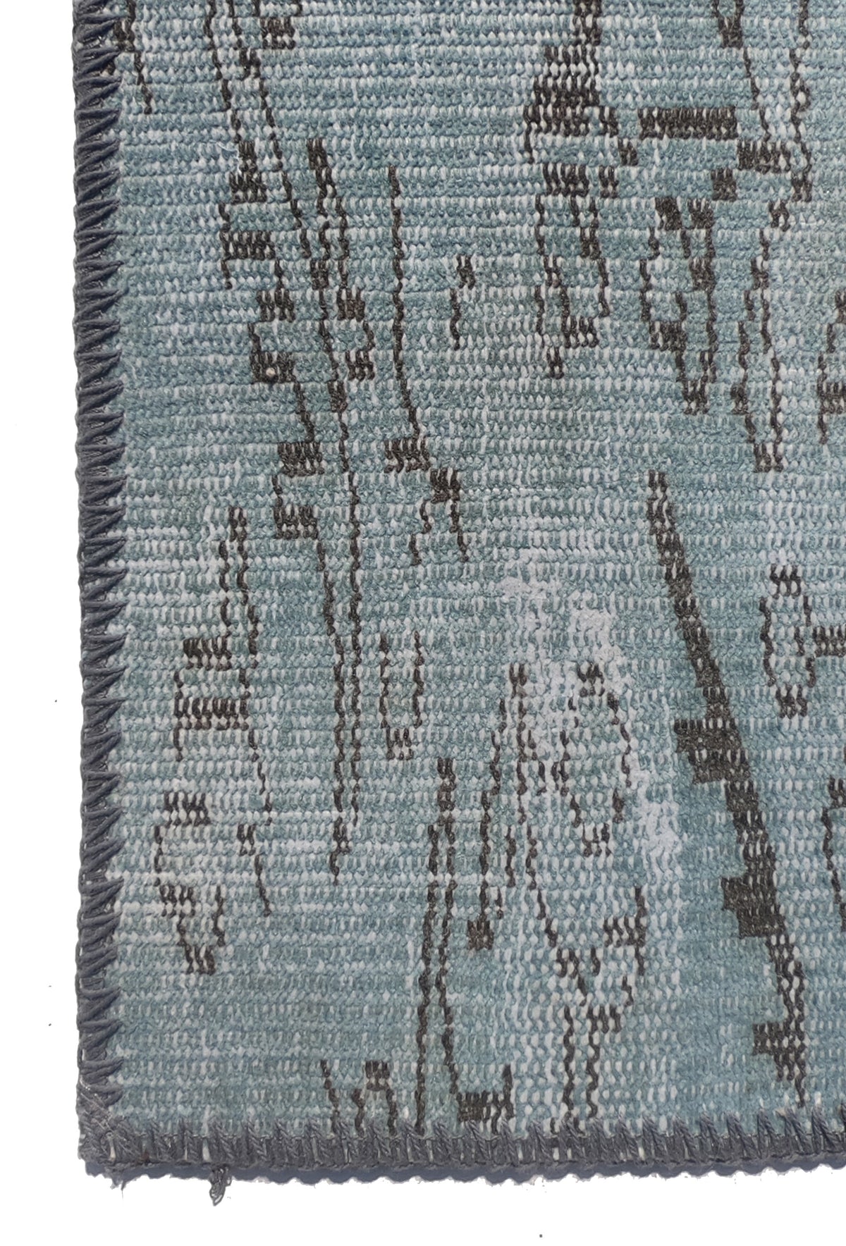 Textura de lana natural en alfombra persa hecha a mano, aspecto envejecido