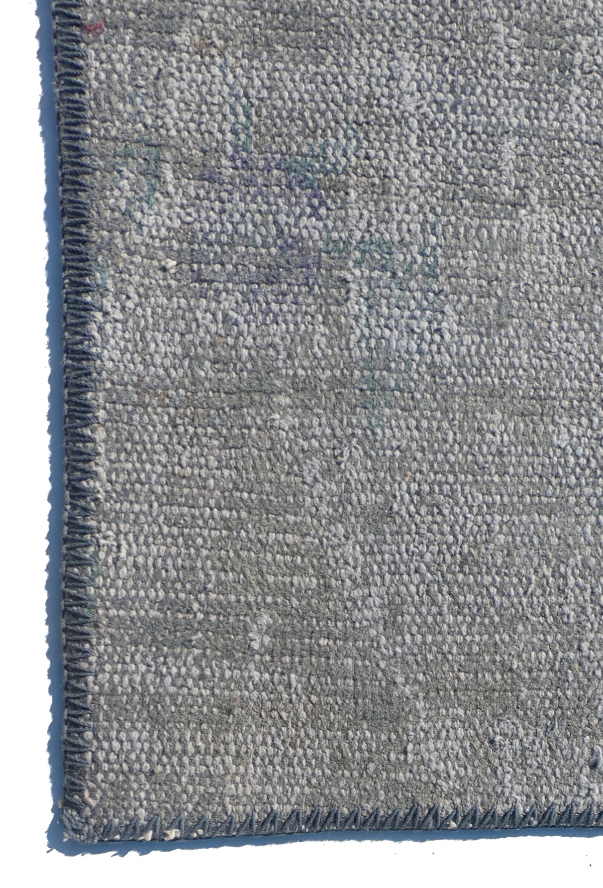 Textura de lana natural en alfombra importada hecha a mano, aspecto envejecido