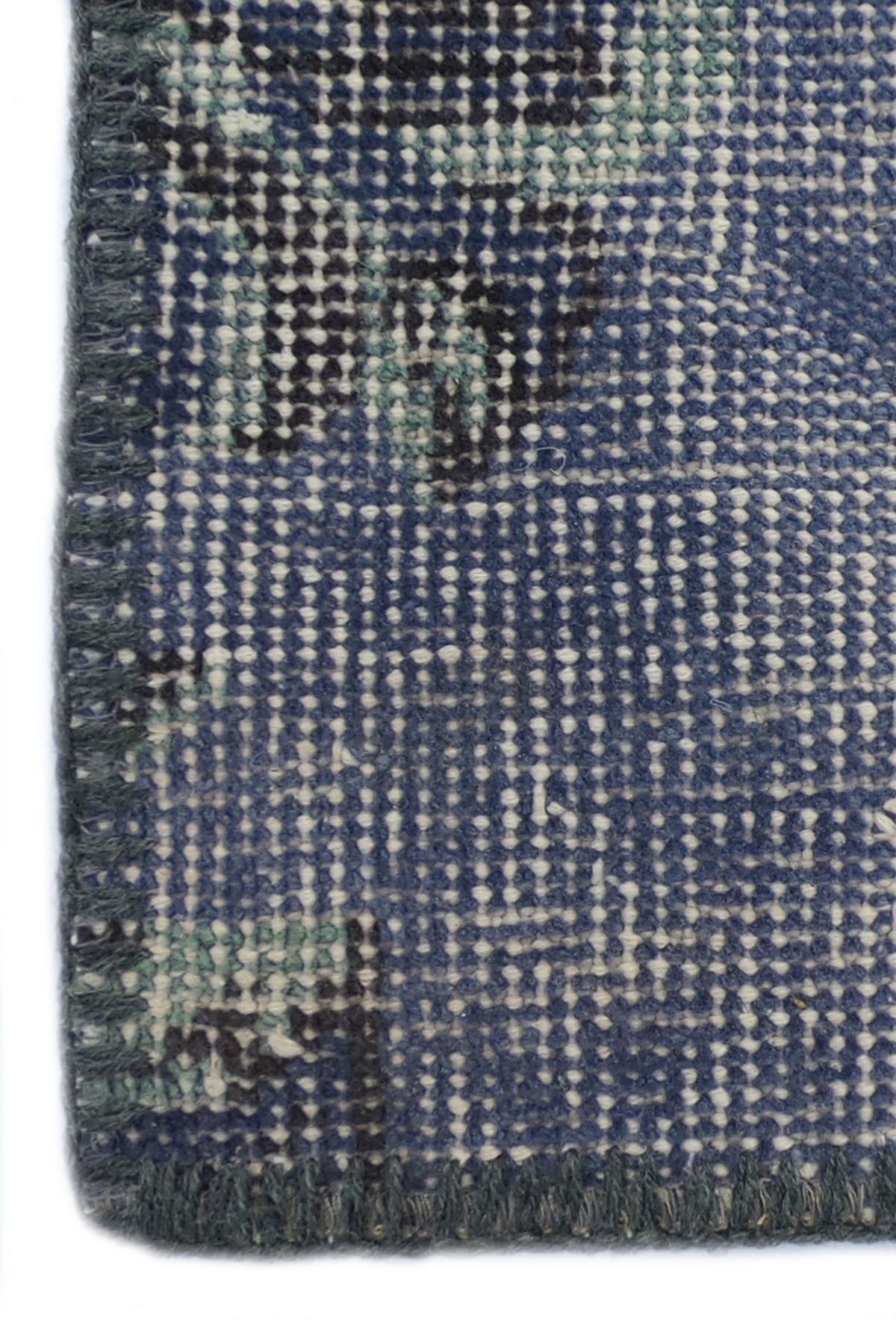 Textura de lana natural en alfombra importada hecha a mano