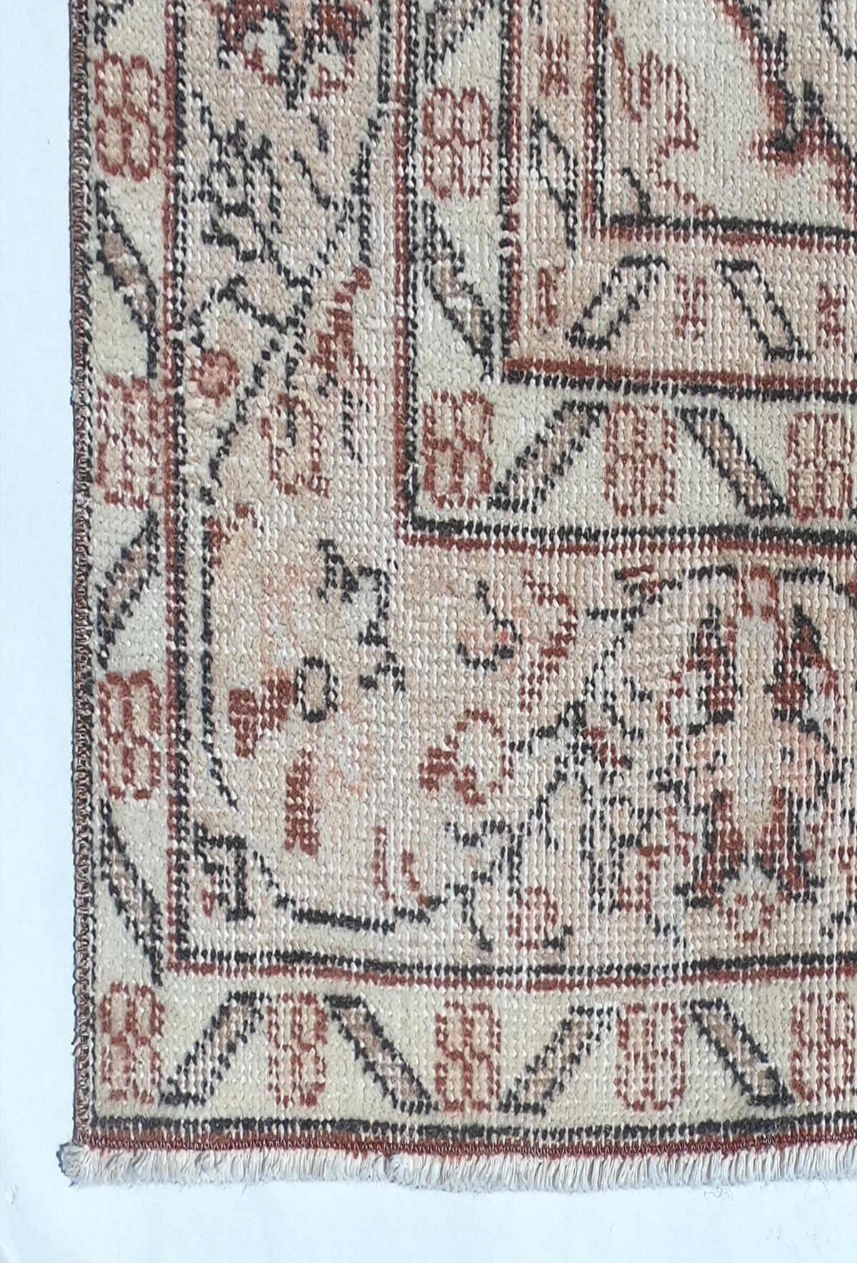 Textura de lana natural en alfombra vintage importada