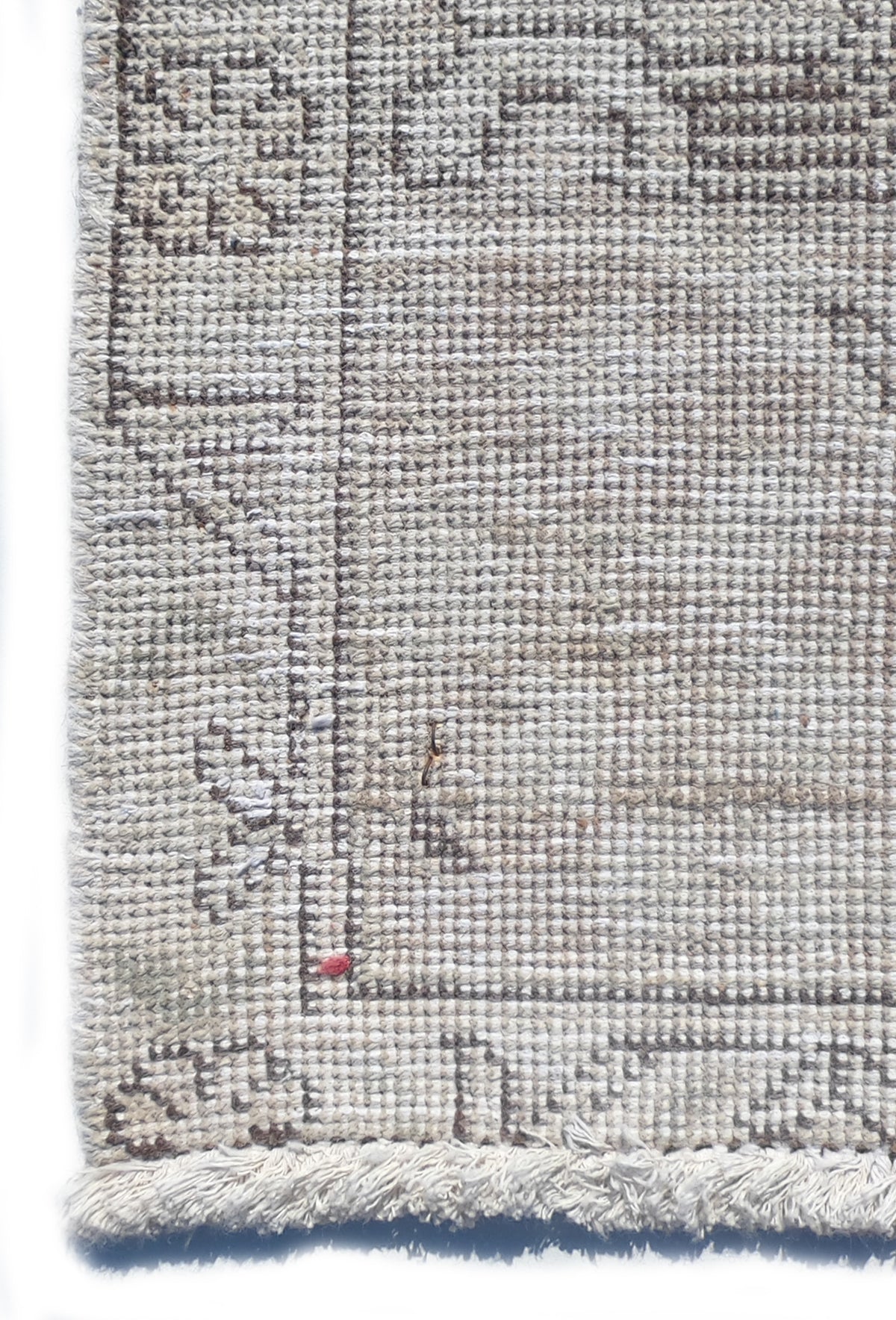 Textura detallada de la lana en alfombra vintage importada, aspecto suave